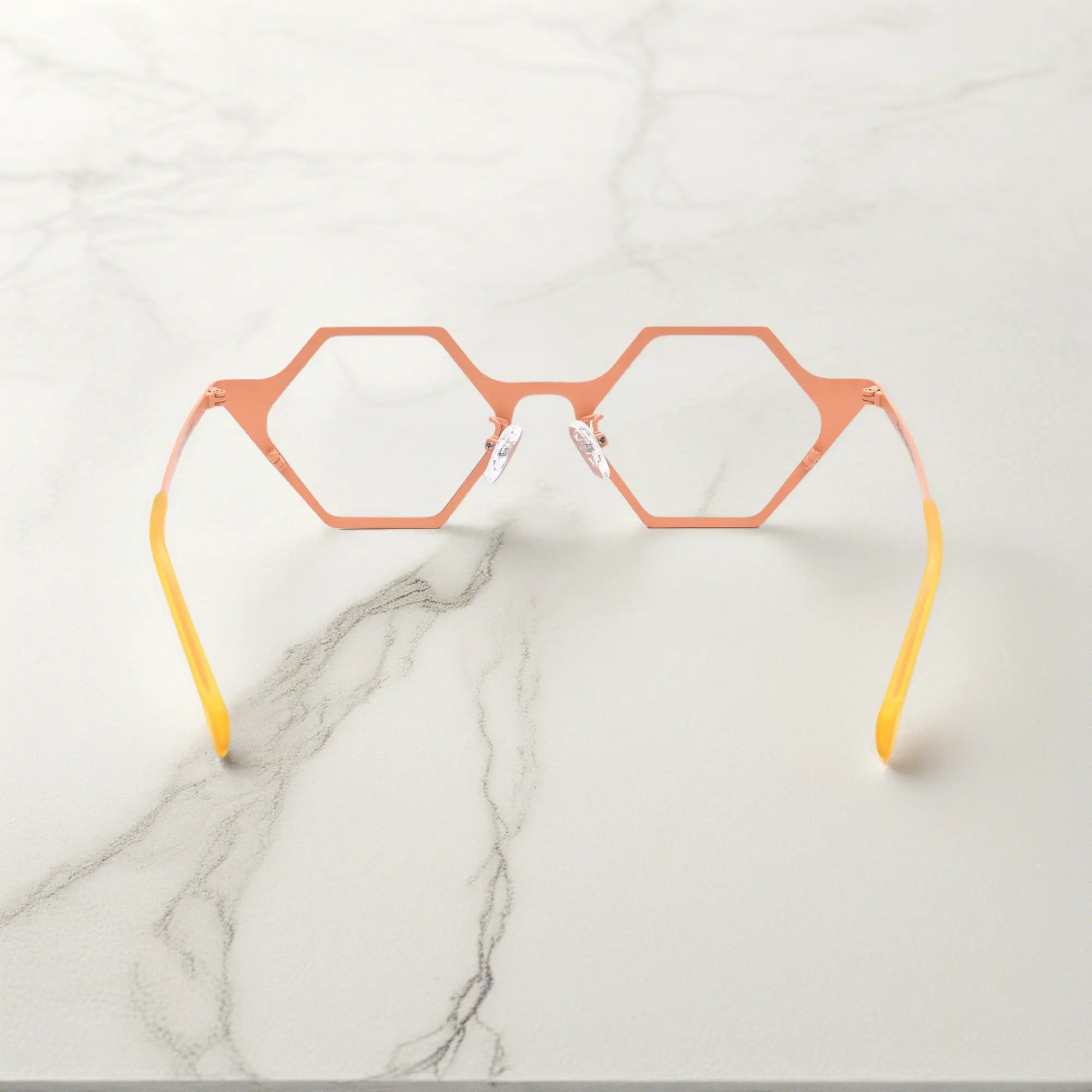 Back angle of VoyueLens™ VL185881 in Coral Frost – polygonal pastel metal frame