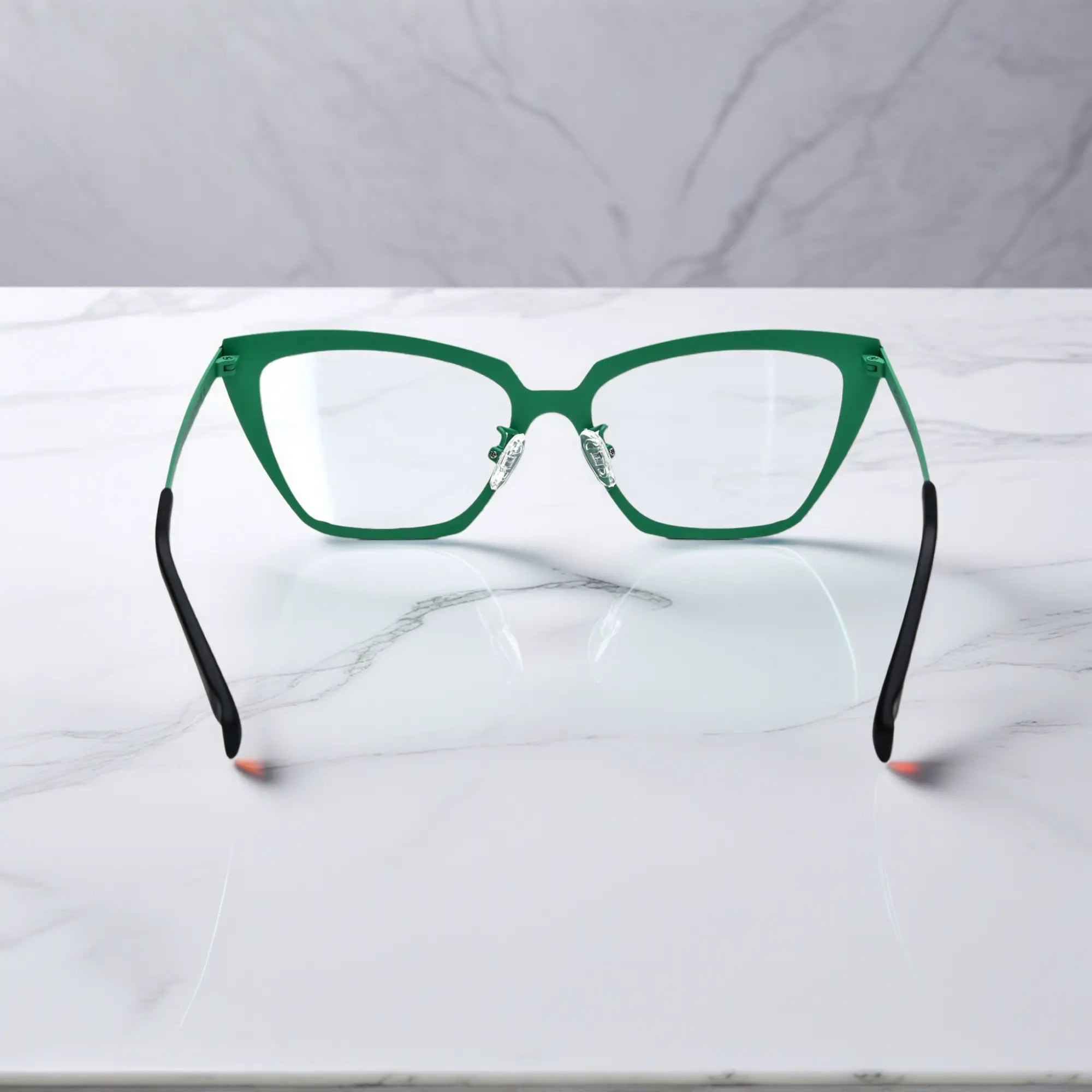 Rear view of VoyueLens™ Crimson Garden titanium frame showing temple design