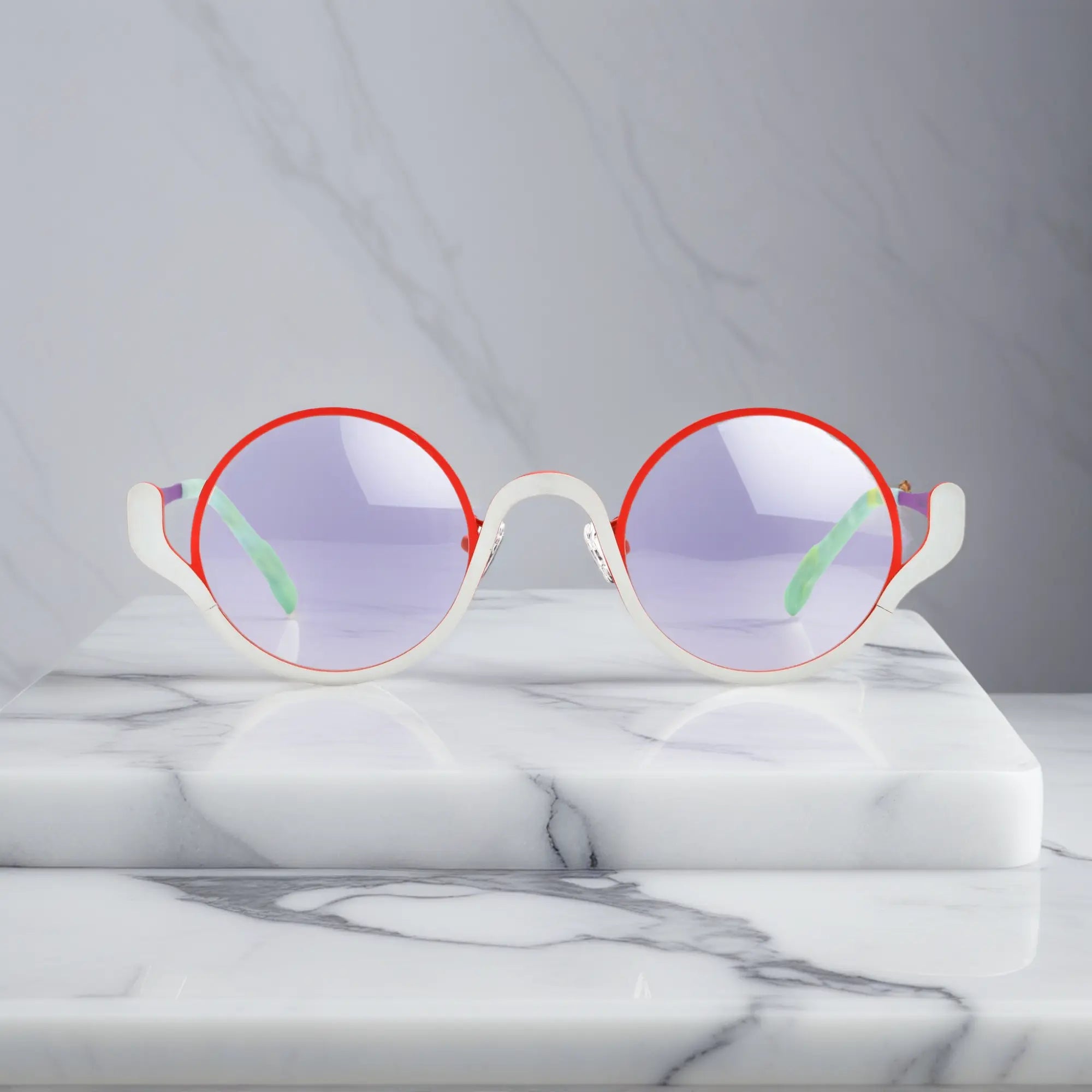 Front view of VoyueLens™ ChromoPop eyeglasses in Crimson Ice – red and white titanium frame