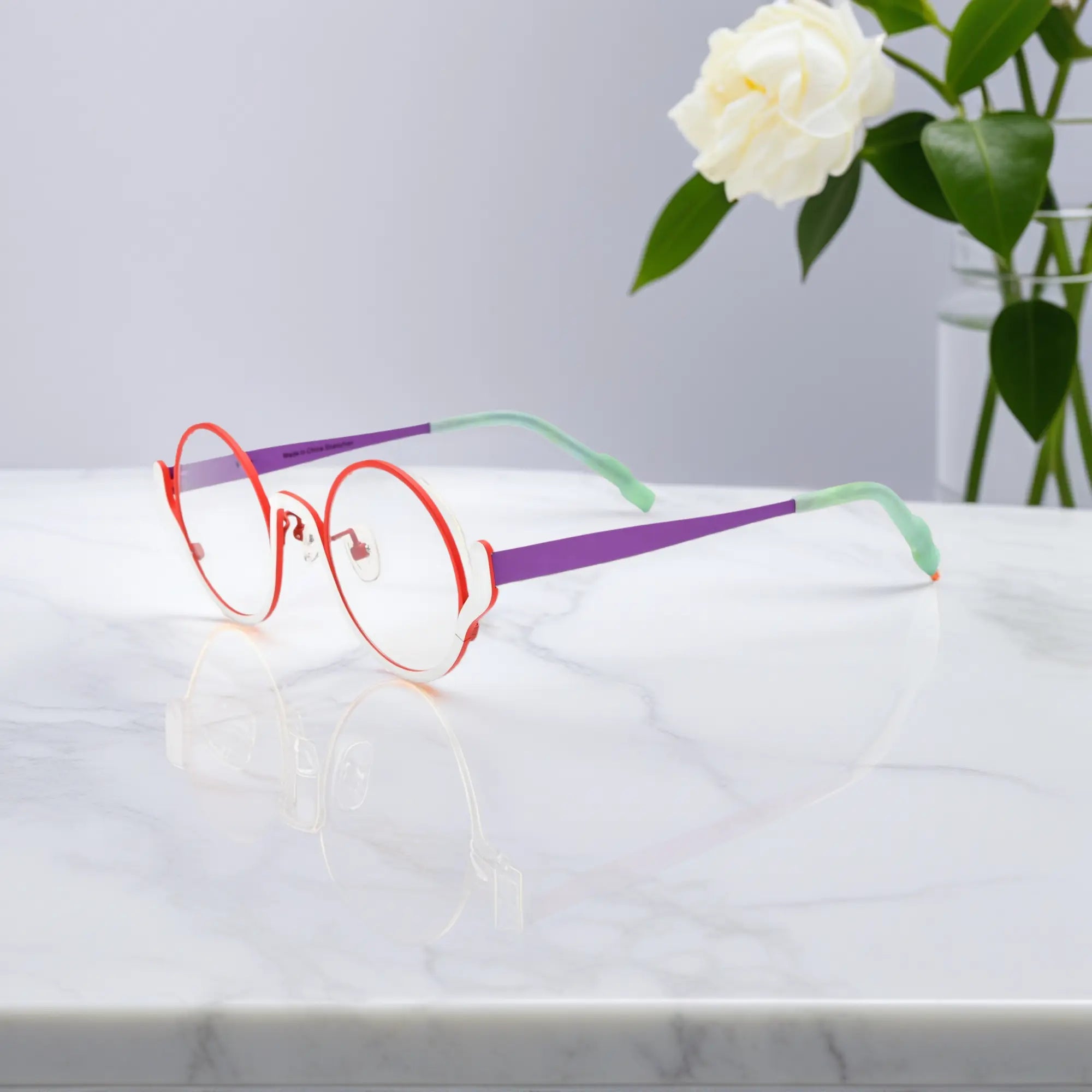 Side view of VoyueLens™ eyeglasses in Crimson Ice – red metallic temples with slim silhouette