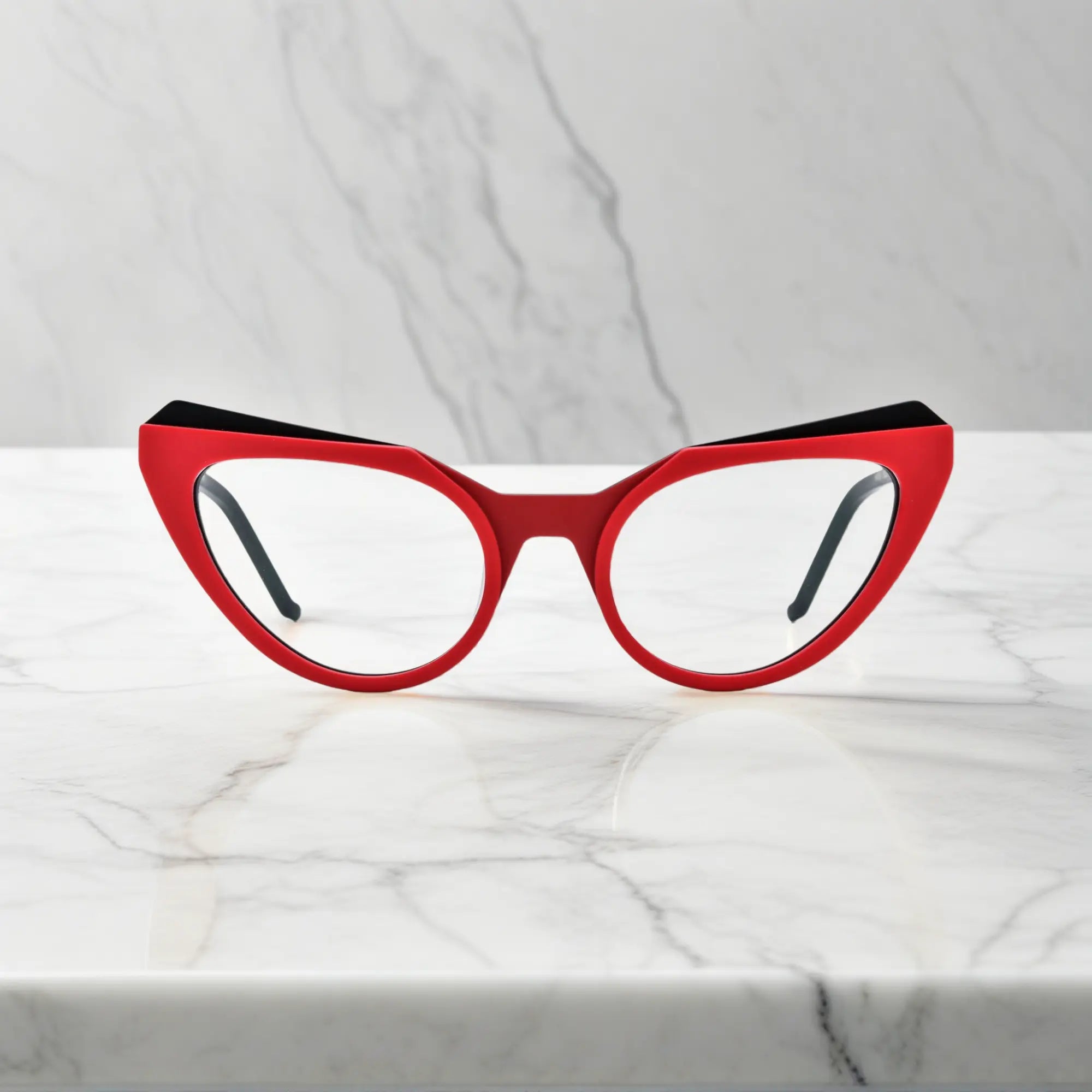Front view of VoyueLens™ Crimson Nebula butterfly eyeglasses in rich matte red with deep green temple accents.