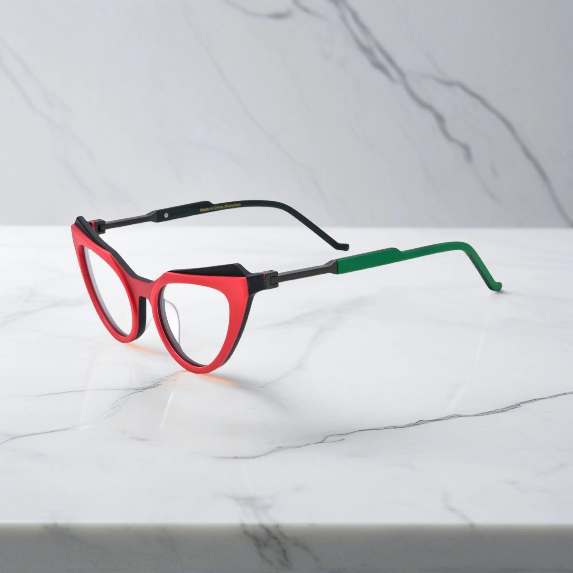 Side profile of Crimson Nebula butterfly eyeglasses featuring a striking color combo and smooth silhouette.