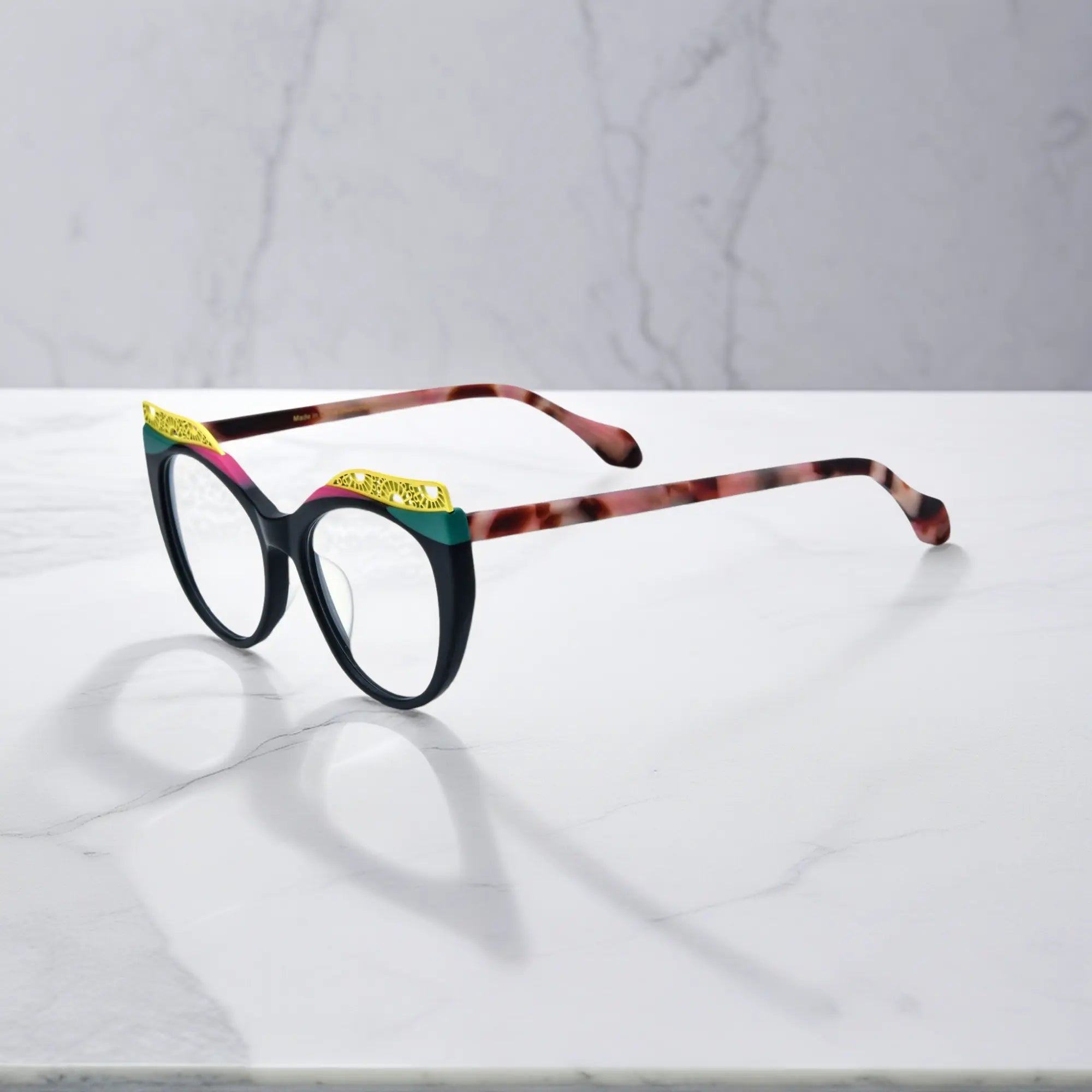 Side View of VoyueLens™ Crimson Nebula cat-eye eyeglasses with matte black with red nebula gradient and signature lace-pattern design.