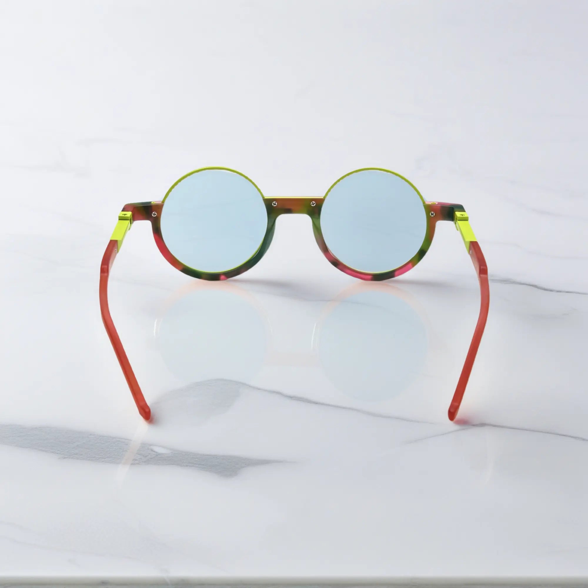 Back view revealing nebula-inspired color mix with matte finish and ergonomic shape.