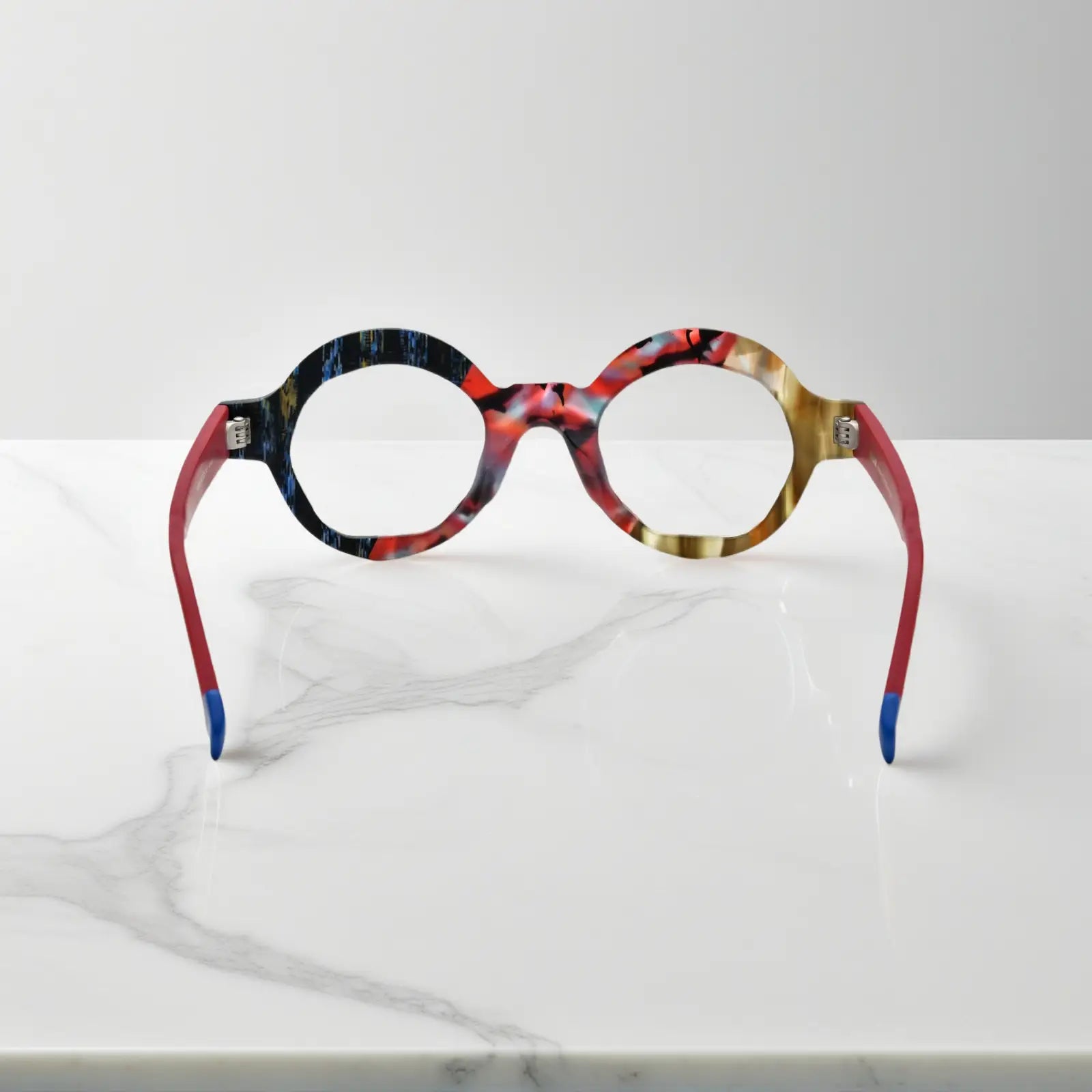 Rear perspective of Crimson Nebula glasses highlighting cosmic-inspired frame details and matte finish