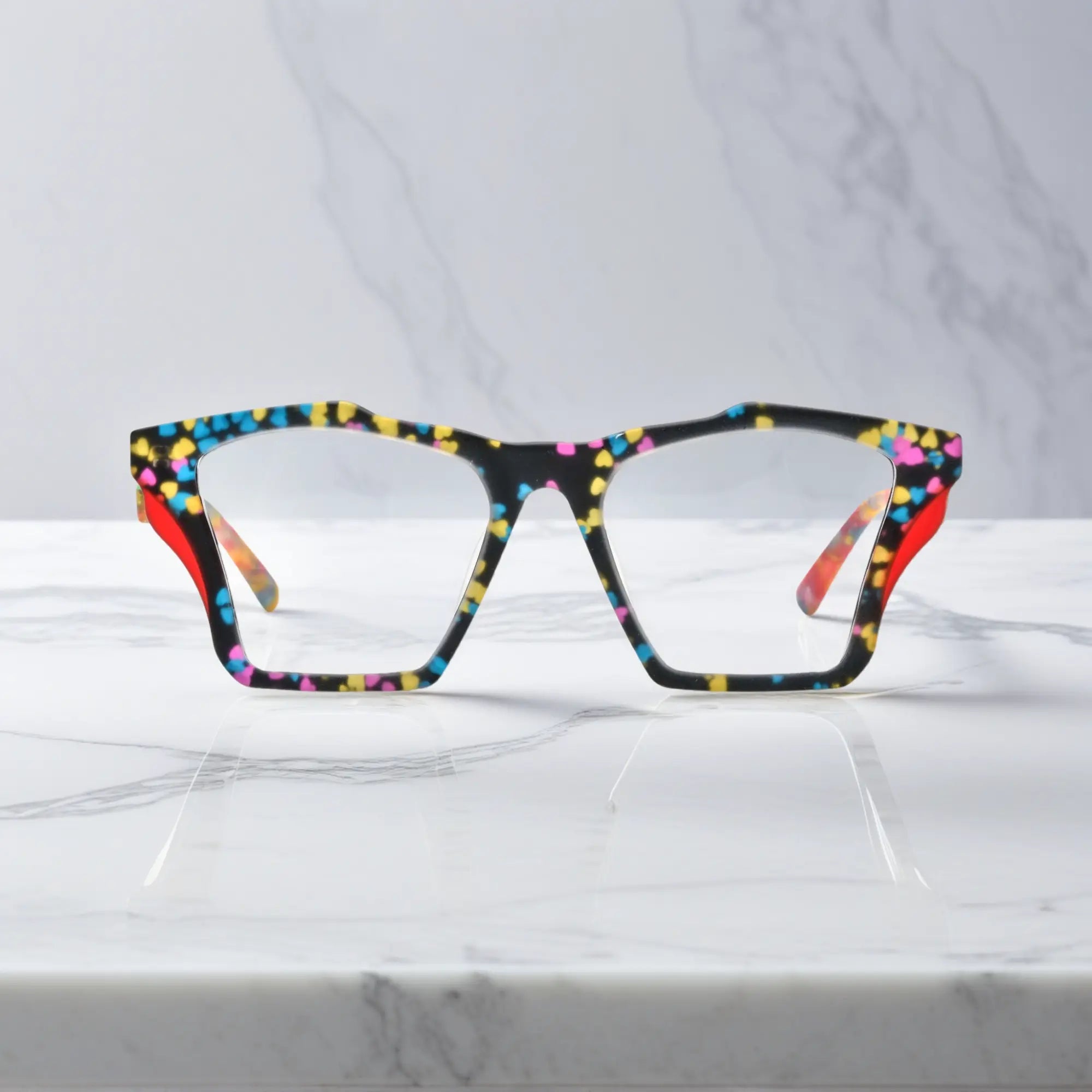 Front-facing view of VoyueLens™ Crystal Confetti butterfly eyeglass frame featuring translucent frosted acetate with pastel speckles, showcasing its signature matte butterfly design.