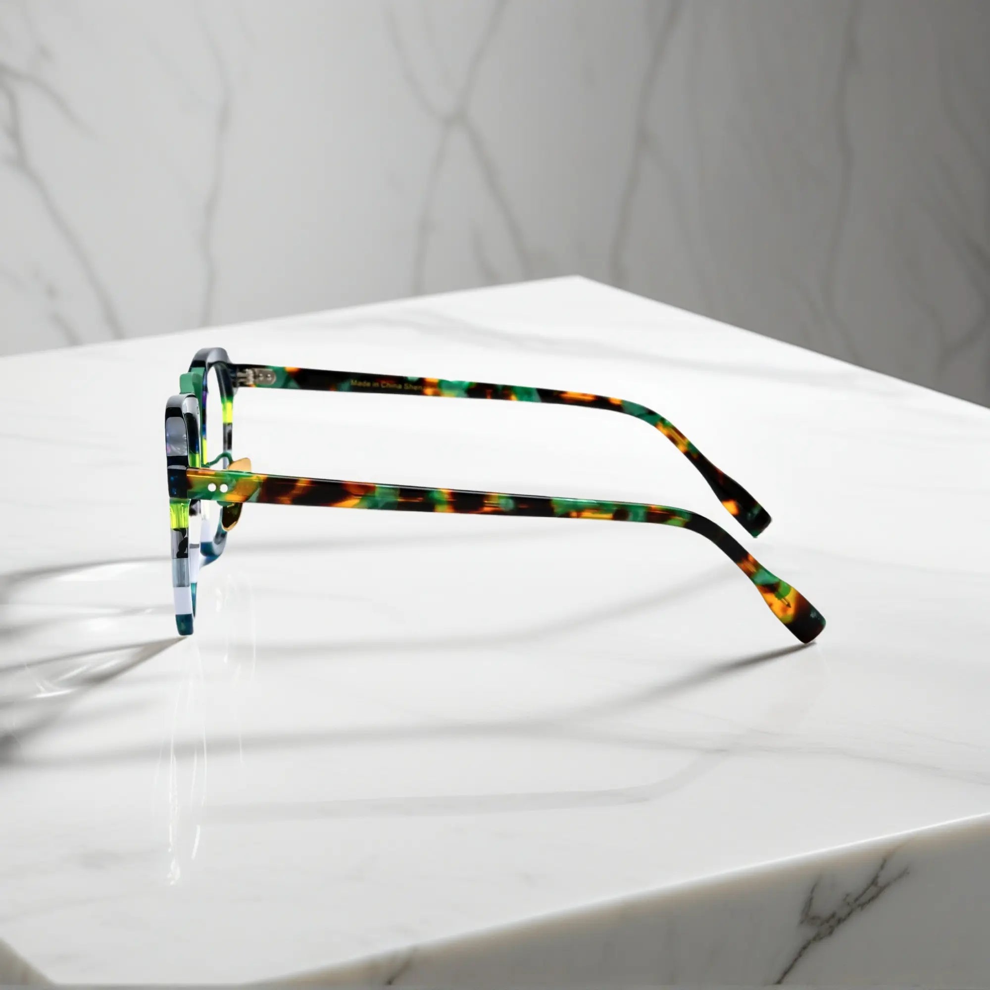 Side profile of VoyueLens Forest Aurora green amber acetate aviator glasses showing temples