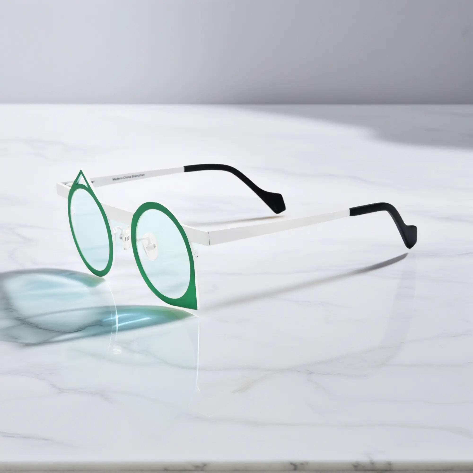 Side profile of VoyueLens™ Forest Ivory polygonal titanium frame, lightweight and tailored for daily comfort.