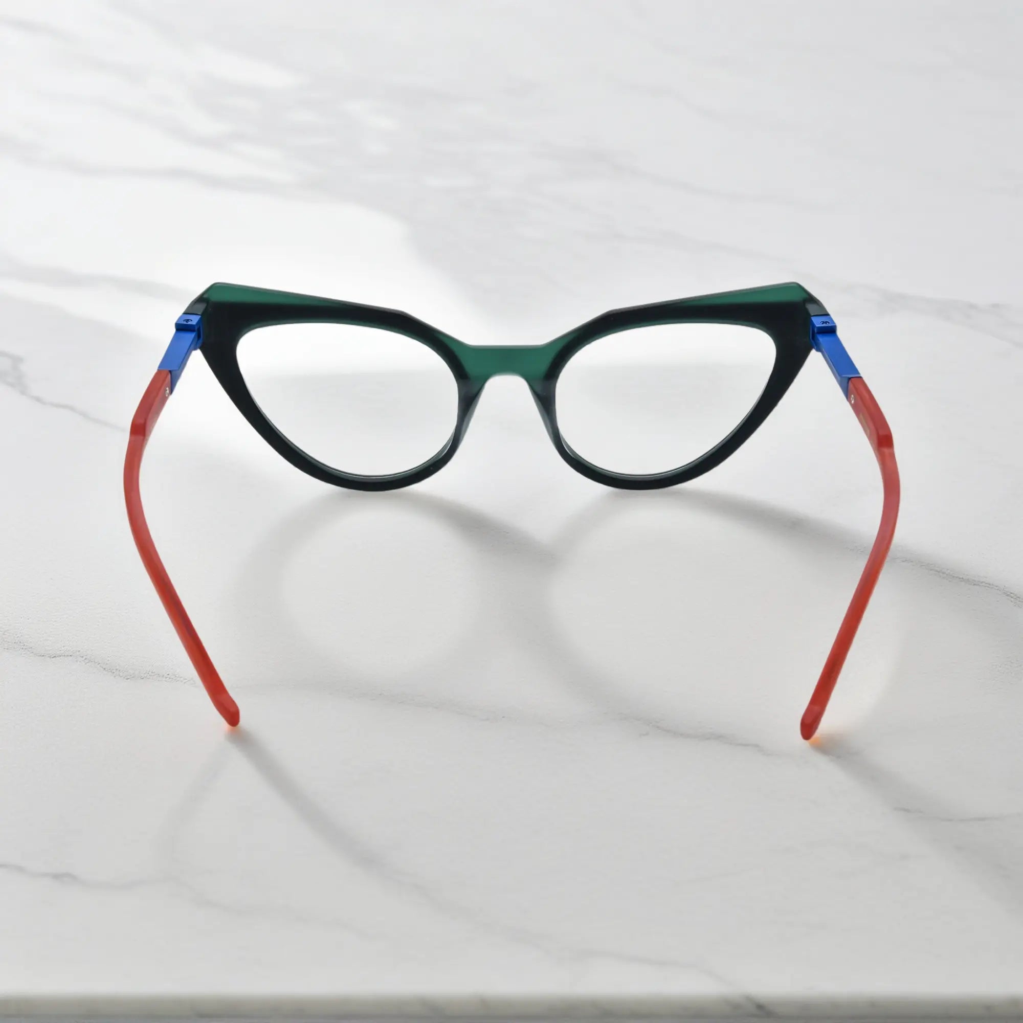 Rear angle of Forest Marble matte acetate butterfly eyeglasses showing the winged temple curve and polished inner arms.