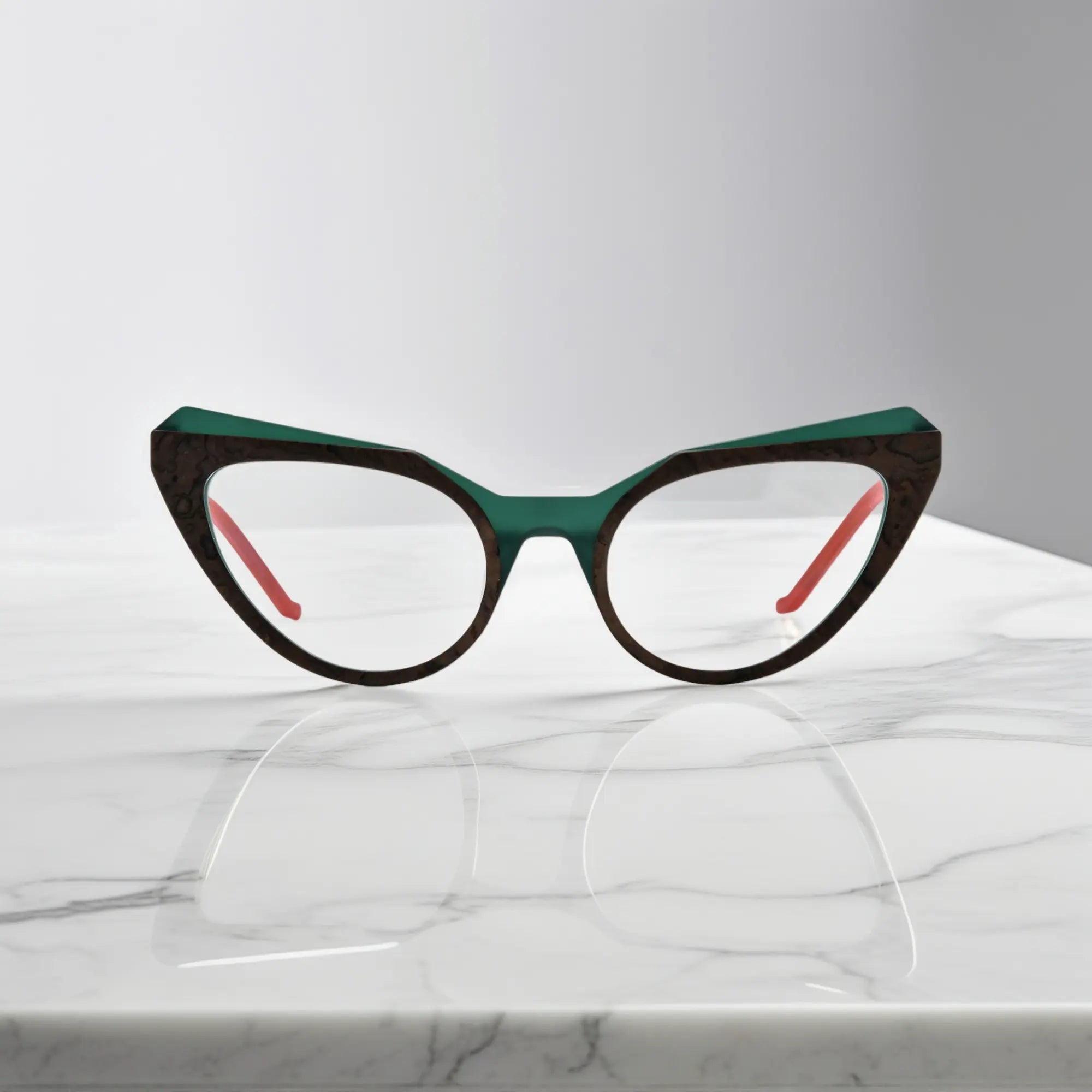 Front view of VoyueLens™ butterfly eyeglasses in Forest Marble color, featuring a sculpted matte acetate frame with earthy green swirls.