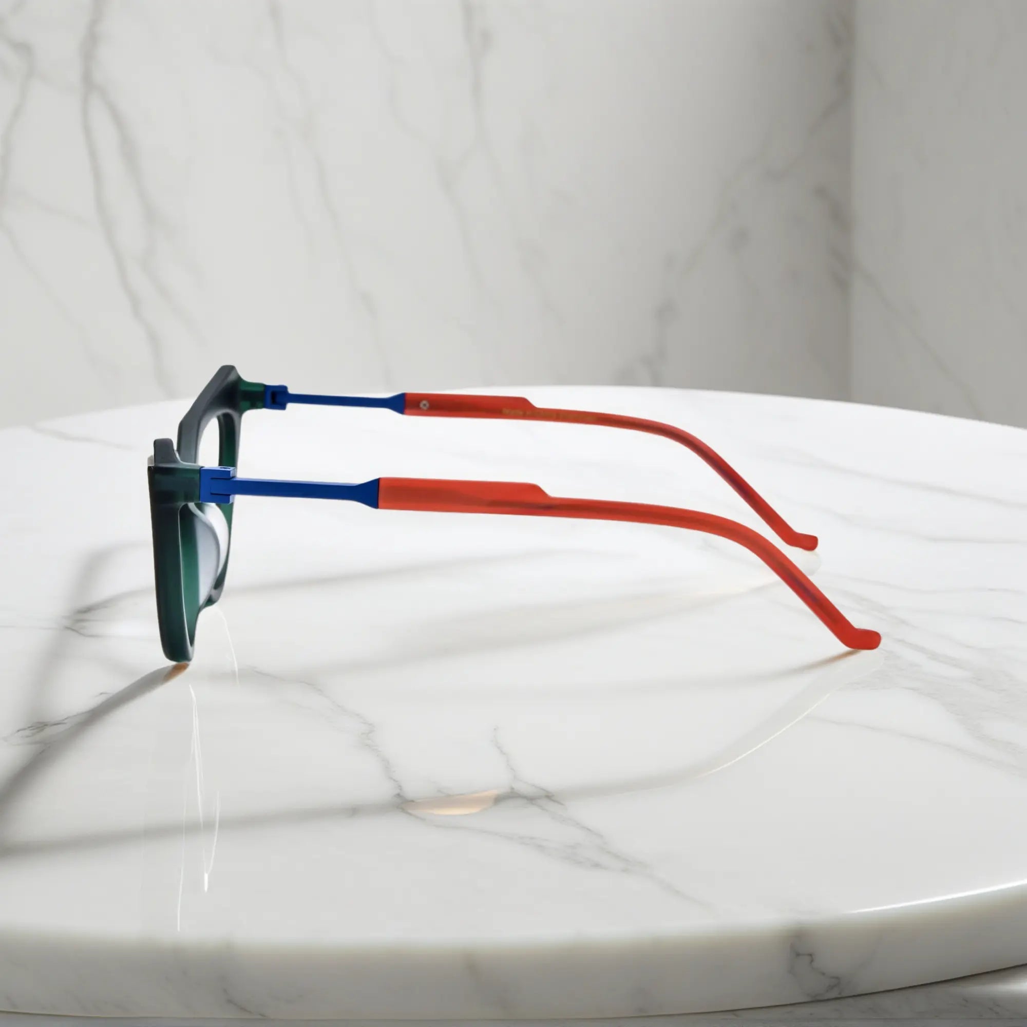Side profile of Forest Marble VoyueLens™ butterfly eyeglasses with translucent green acetate arms and spring hinges.showing temples.