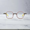 Front shot of Graphite Blush eyeglasses with stylish square-round hybrid lens shape.