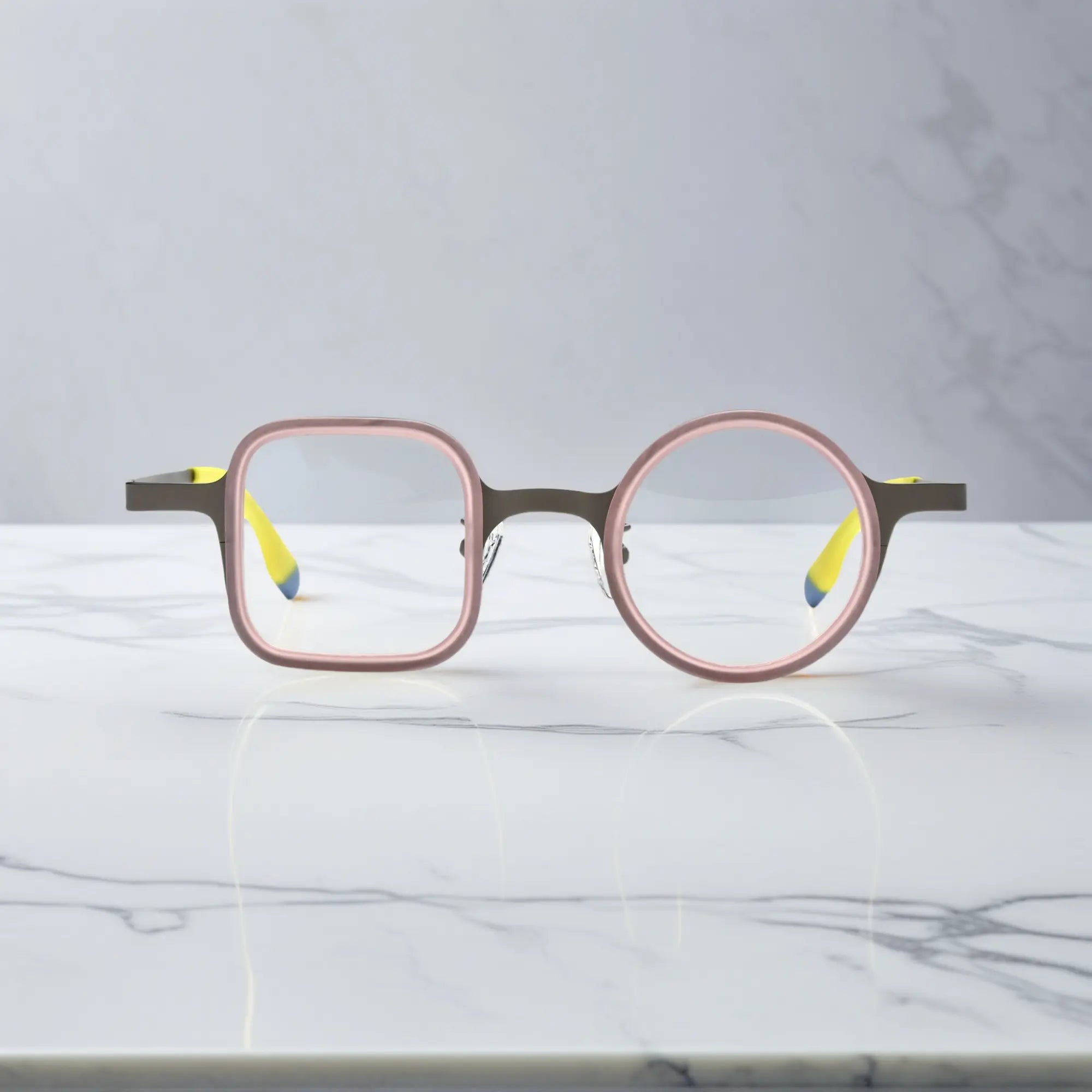Front shot of Graphite Blush eyeglasses with stylish square-round hybrid lens shape.