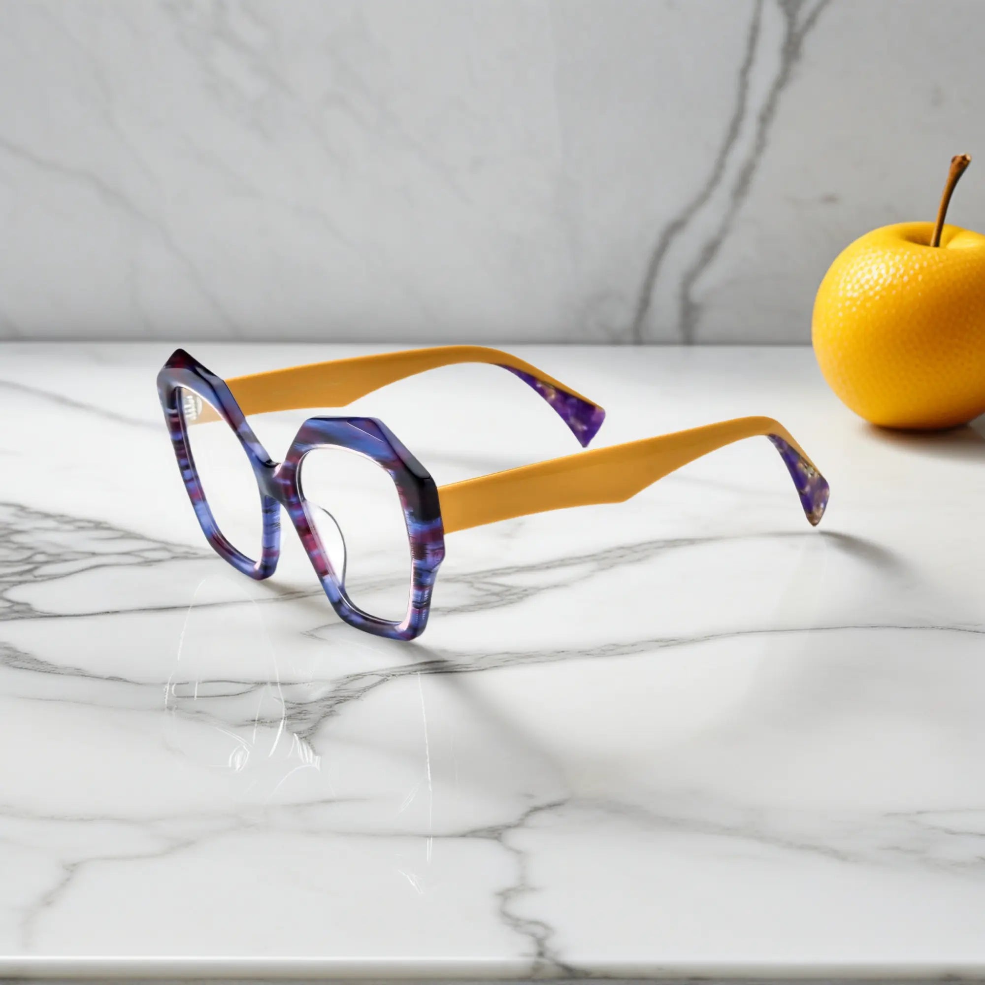 Side shot showing golden acetate temples and layered texture of Honey Amber frame.