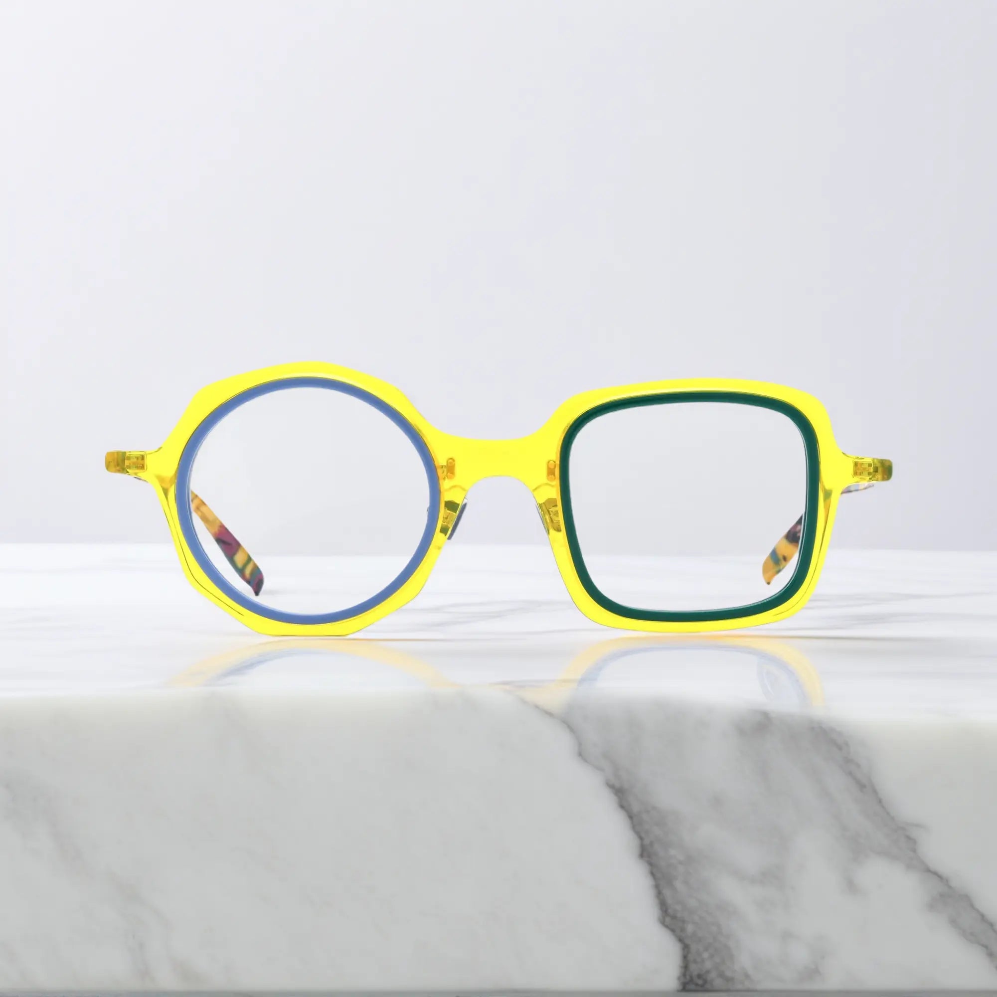 VoyueLens™ geometric eyeglasses in Honey Mint color, shown in front view. Features acetate frame and silicone nose pads.