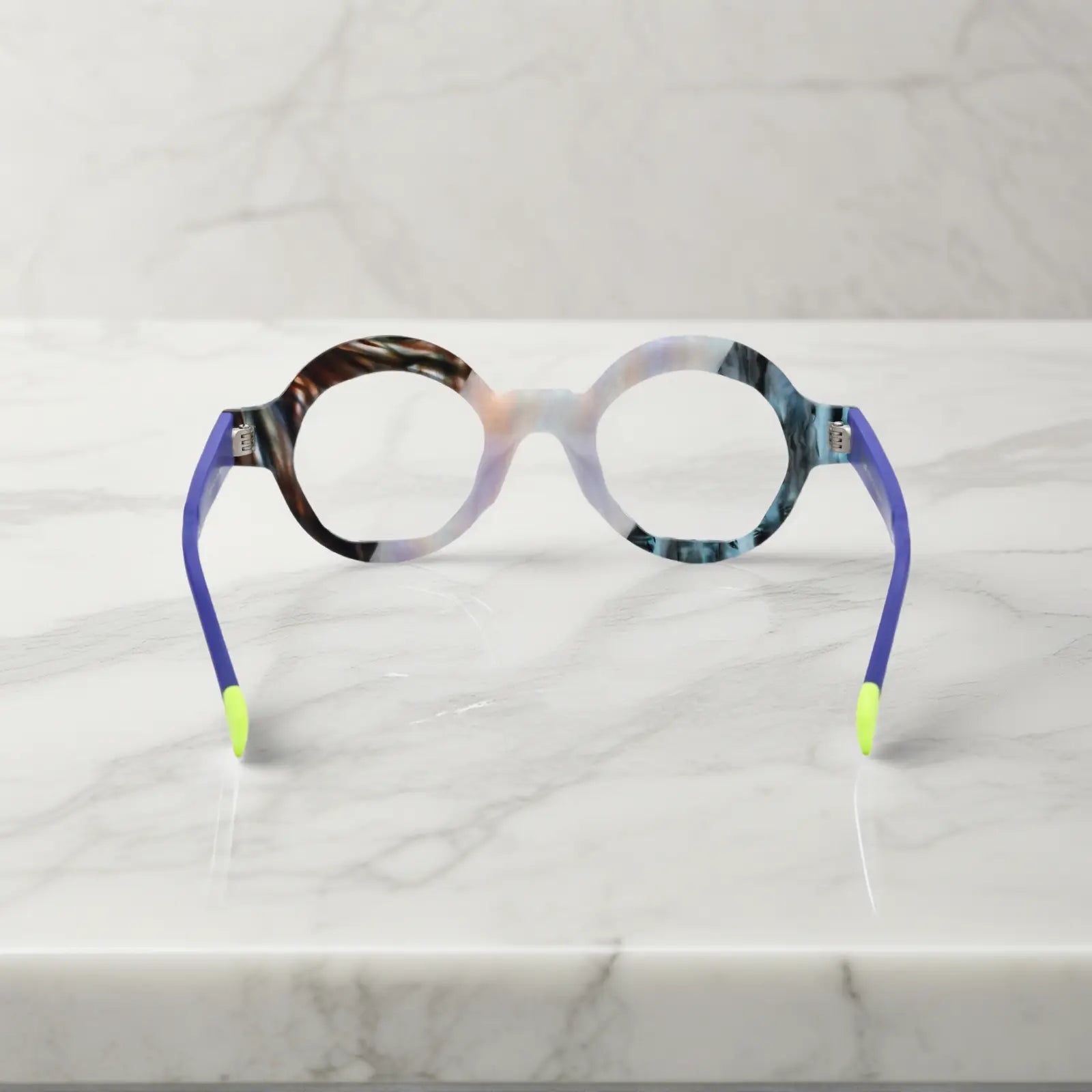 Rear view of Ice Marble frame with soft matte temples and spring hinges designed for secure everyday wear