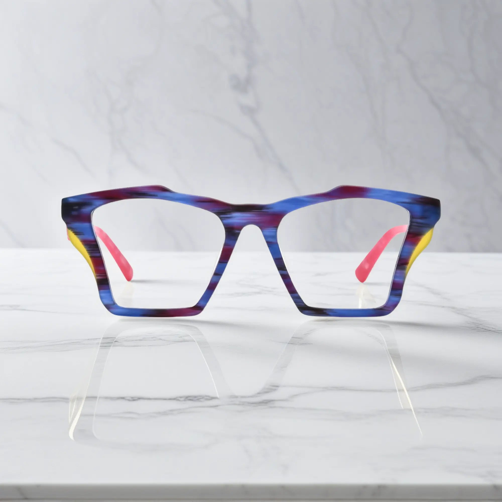 Front-facing view of VoyueLens™ Indigo Wave butterfly eyeglass frame featuring matte striped indigo with flowing tonal patterns, showcasing its signature matte butterfly design.