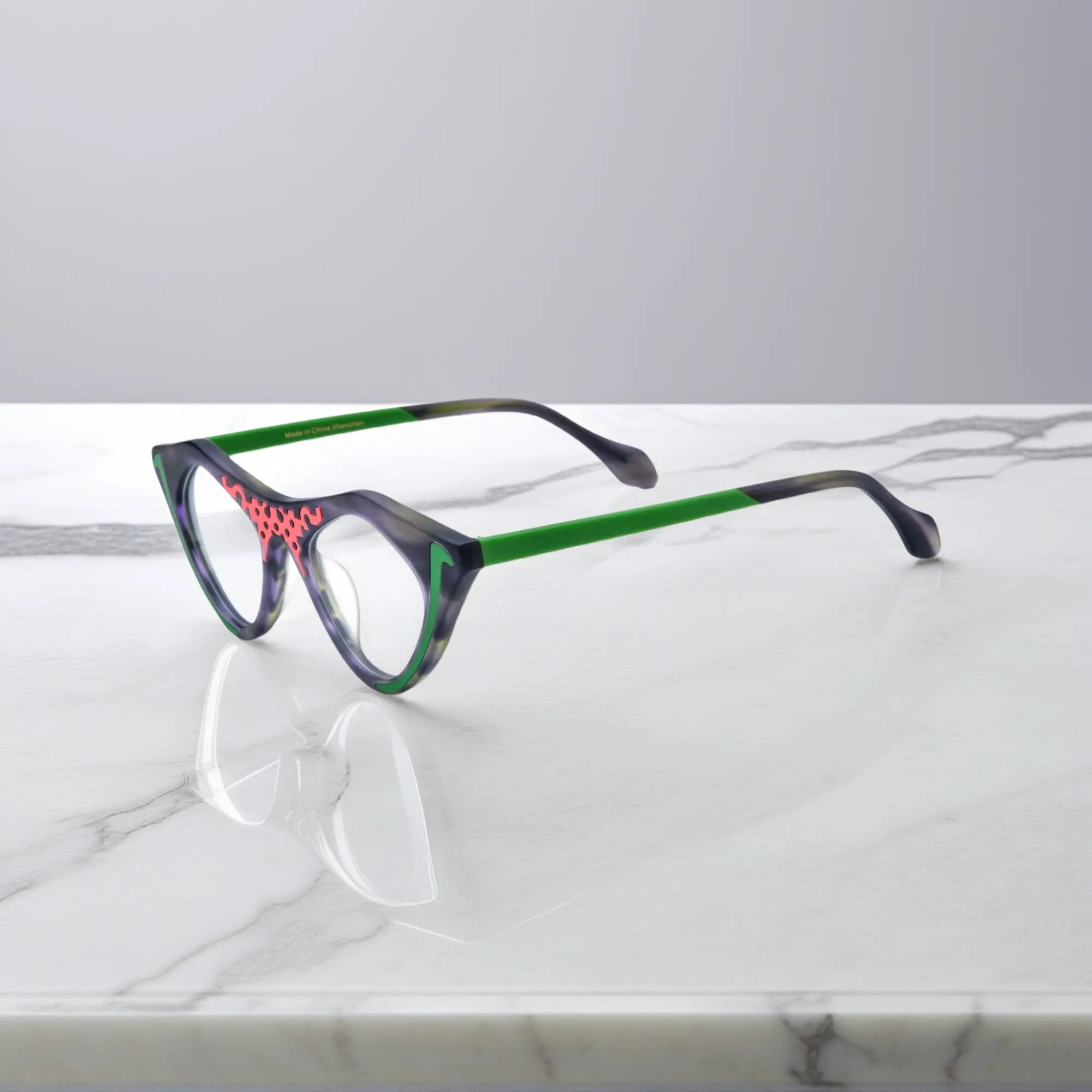 Jungle Moss VoyueLens™ pixel cat-eye glasses side view highlighting acetate-metal mix