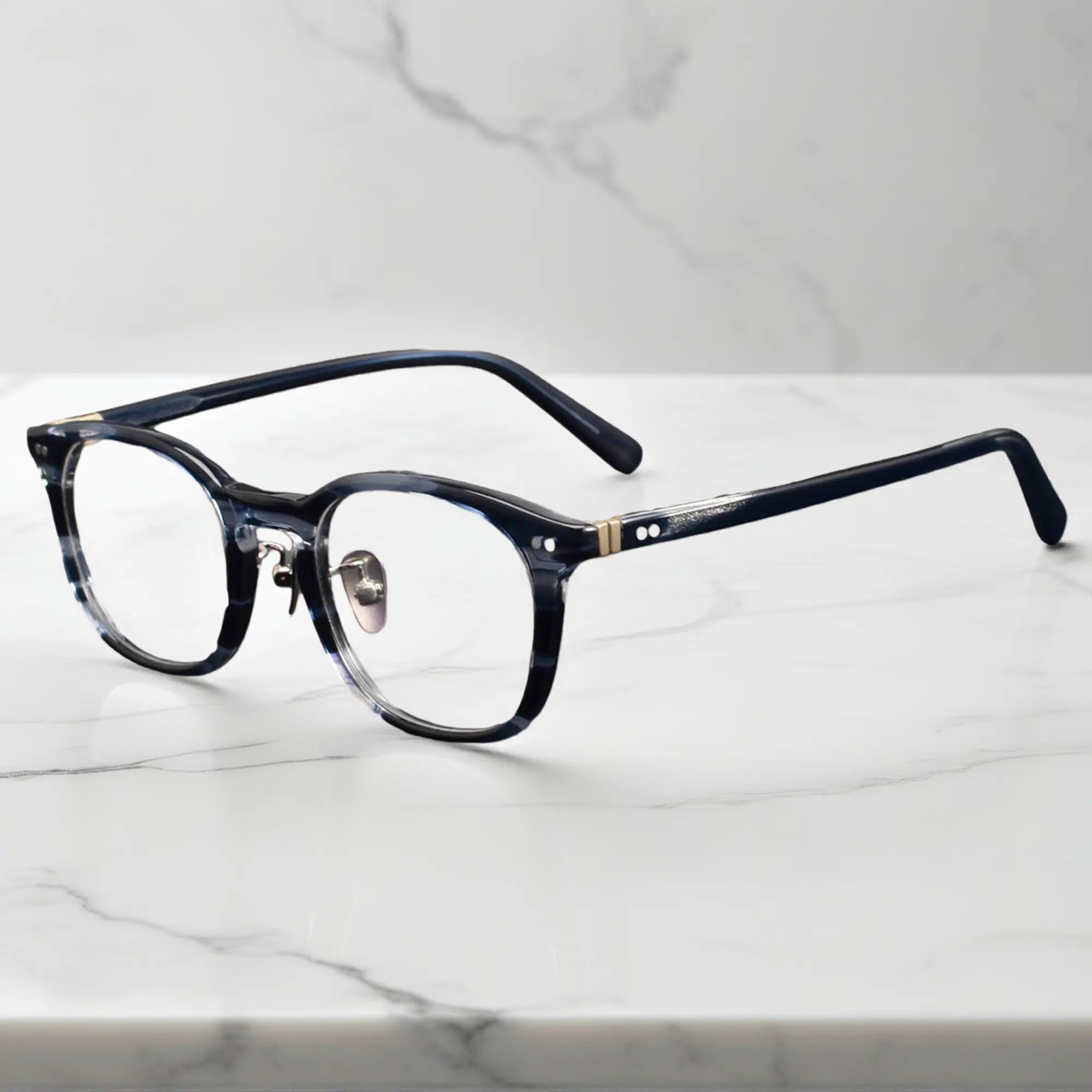 side view showing titanium nose pads and metal rivet hinge detail of KA62 blue tortoise color frame