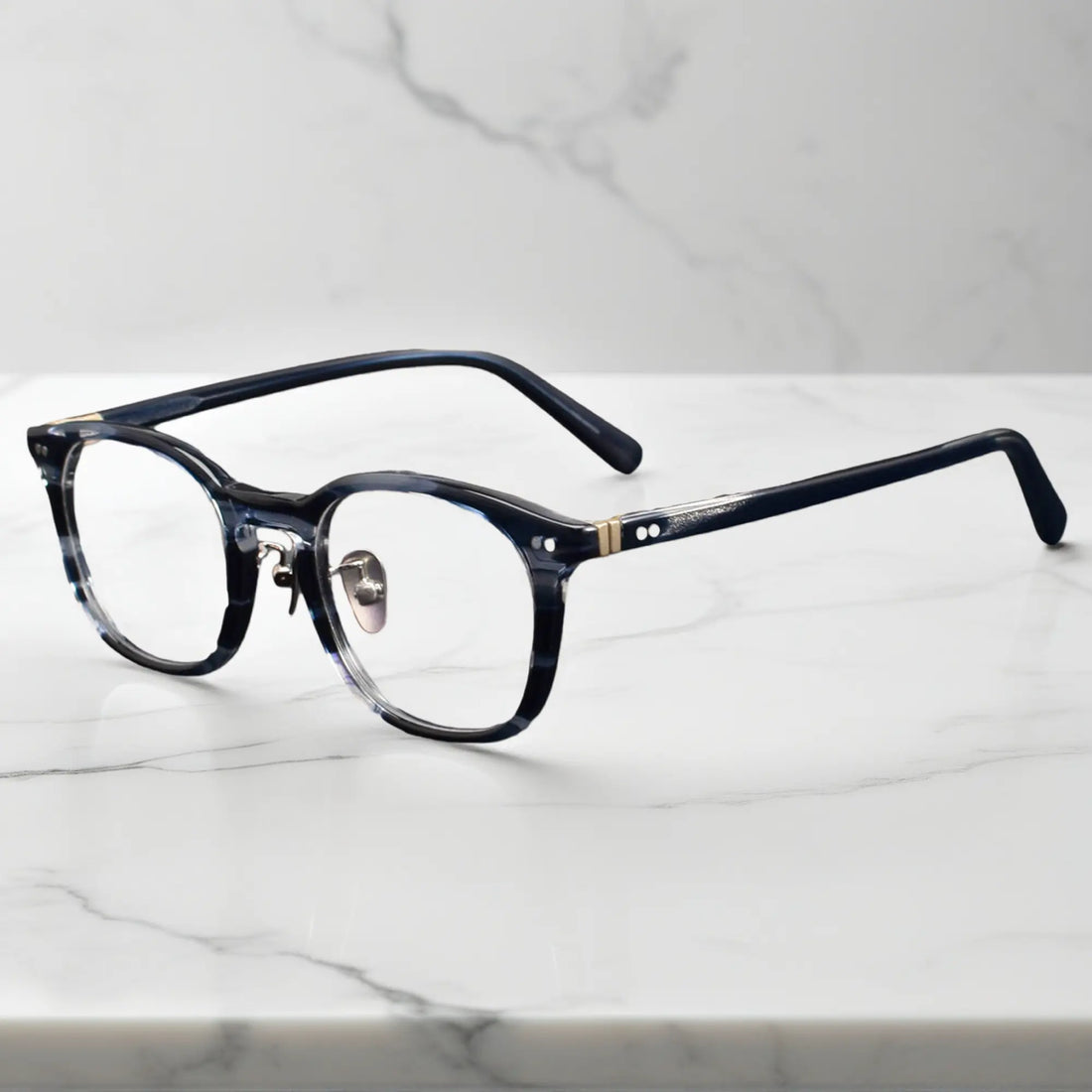 side view showing titanium nose pads and metal rivet hinge detail of KA62 blue tortoise color frame
