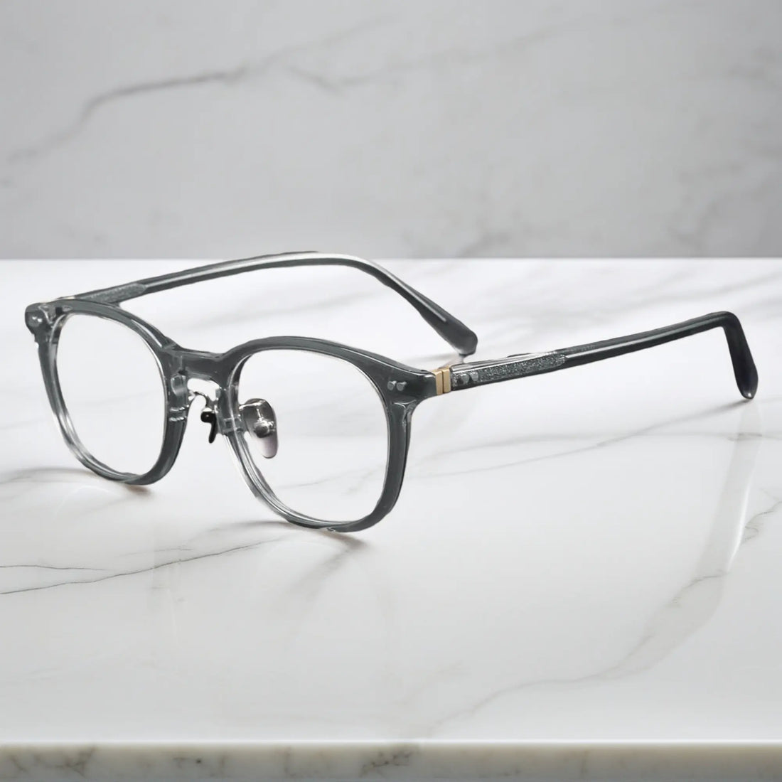 side view showing titanium nose pads and metal rivet hinge detail of KA62 transparent gray color frame