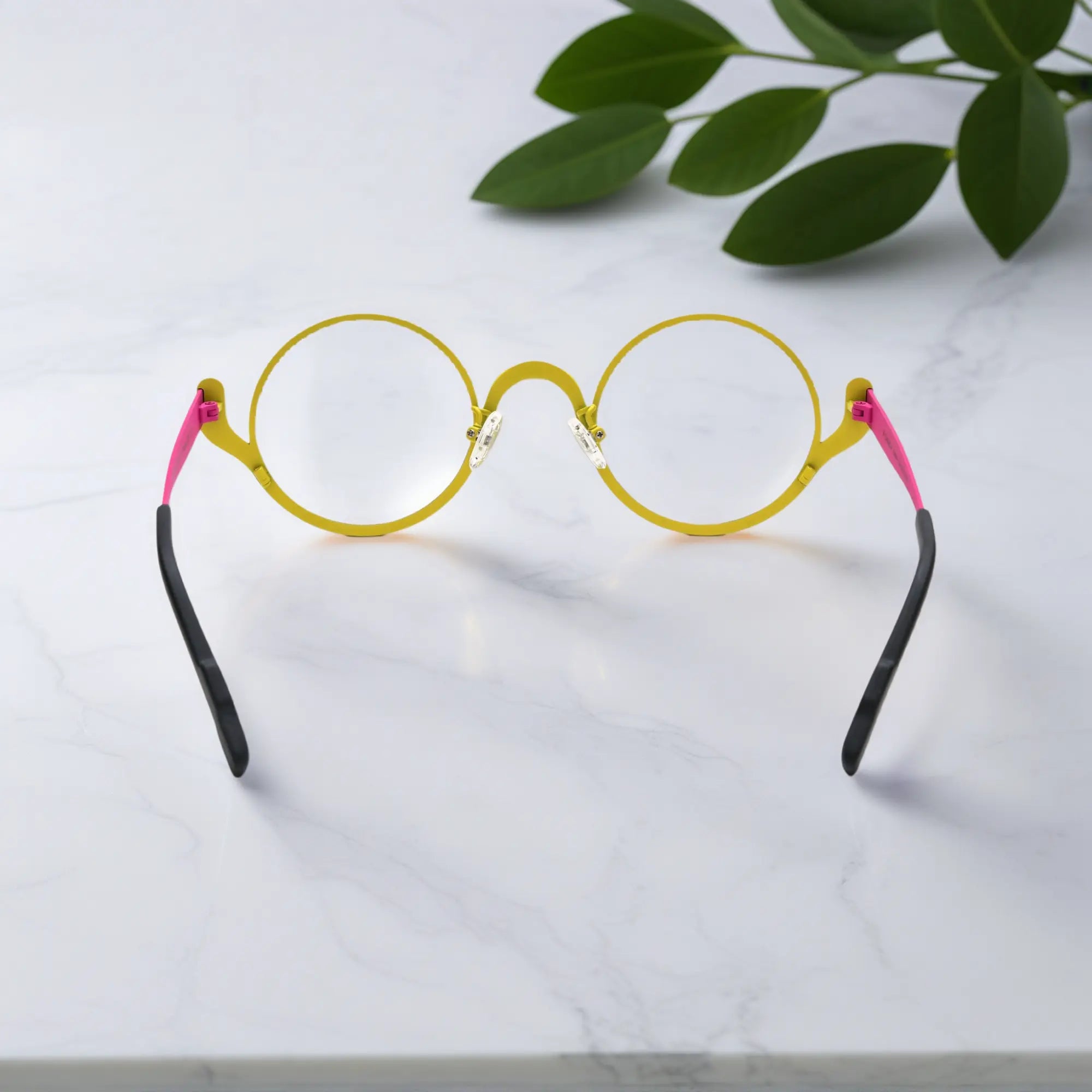 Rear shot of Lemon Graphite round titanium frames – flexible temples in view