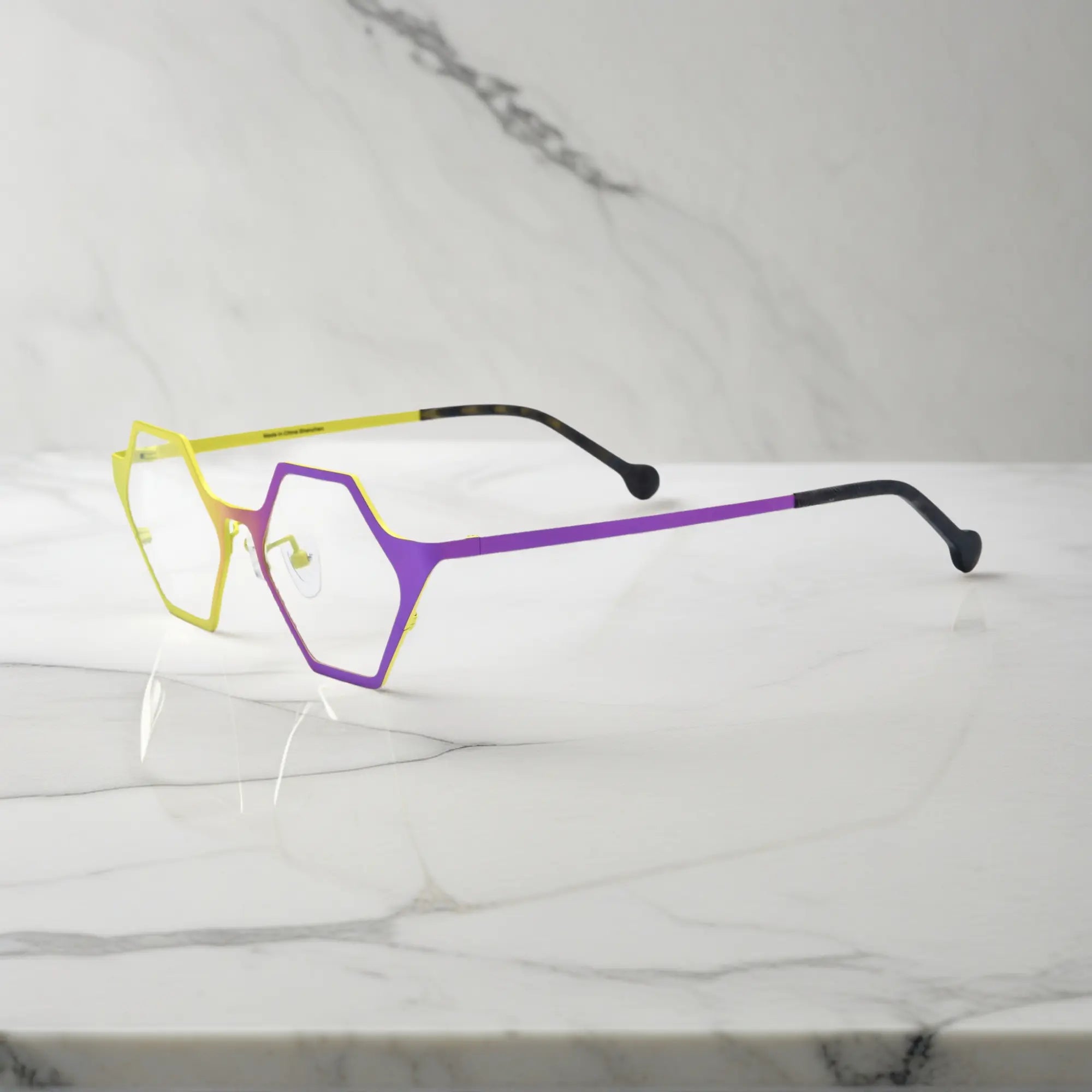Side view of VoyueLens™ VL185881 in Lemon Orchid – bold colorful titanium design