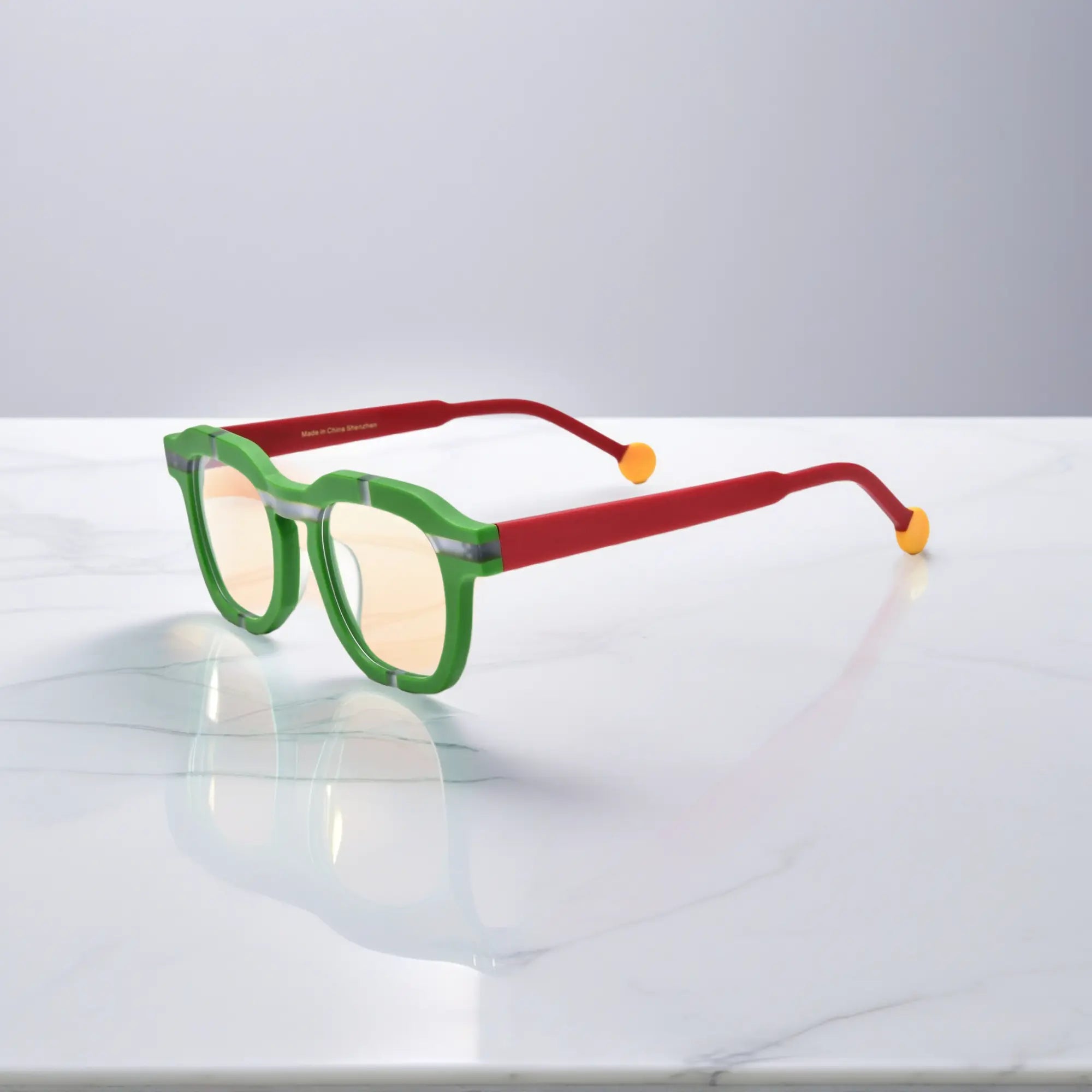 Side view of VoyueLens™ VL19363 Lime Blaze matte green eyeglasses with red temples and yellow tips