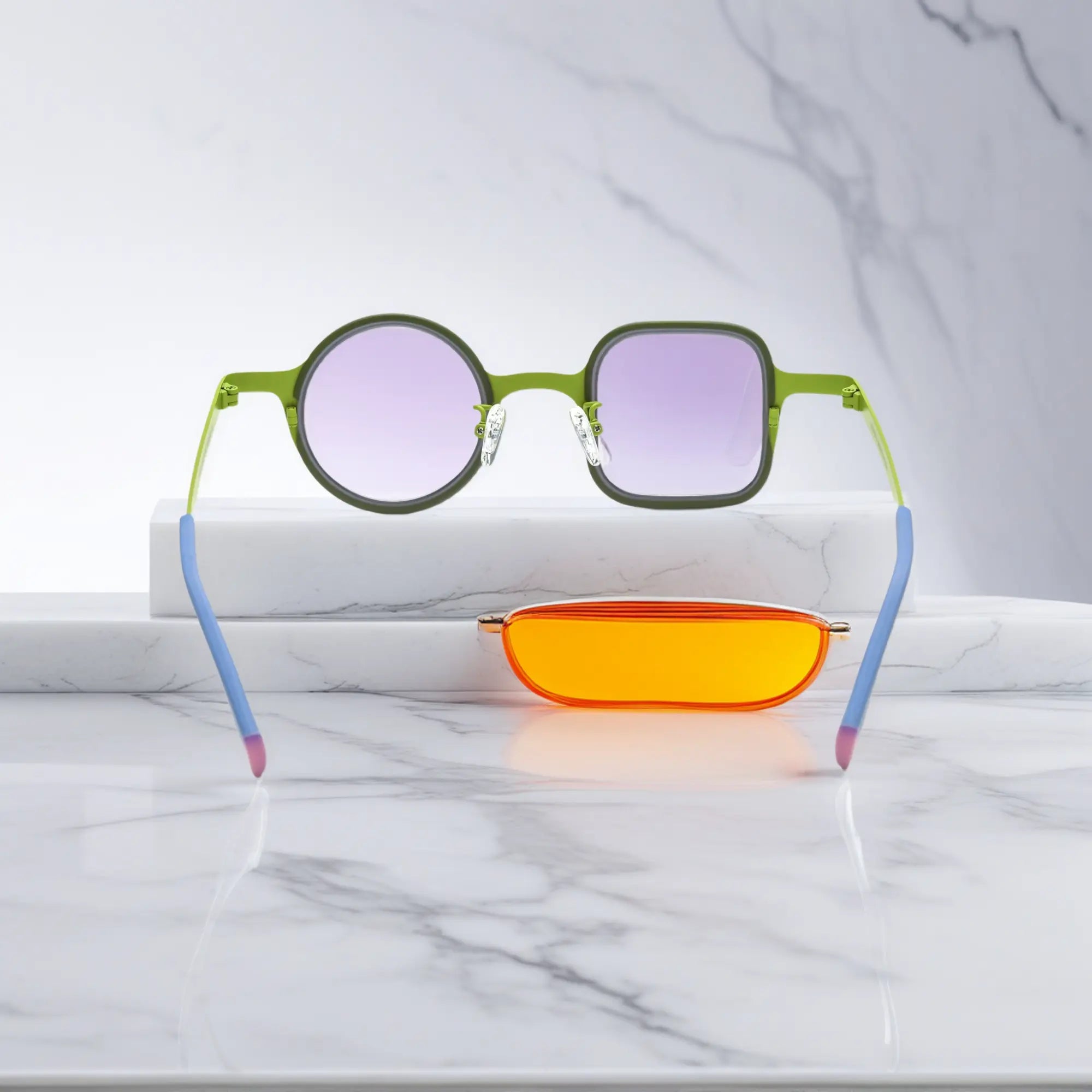 Rear shot of Meadow Green variant featuring titanium support arms and ergonomic curve.