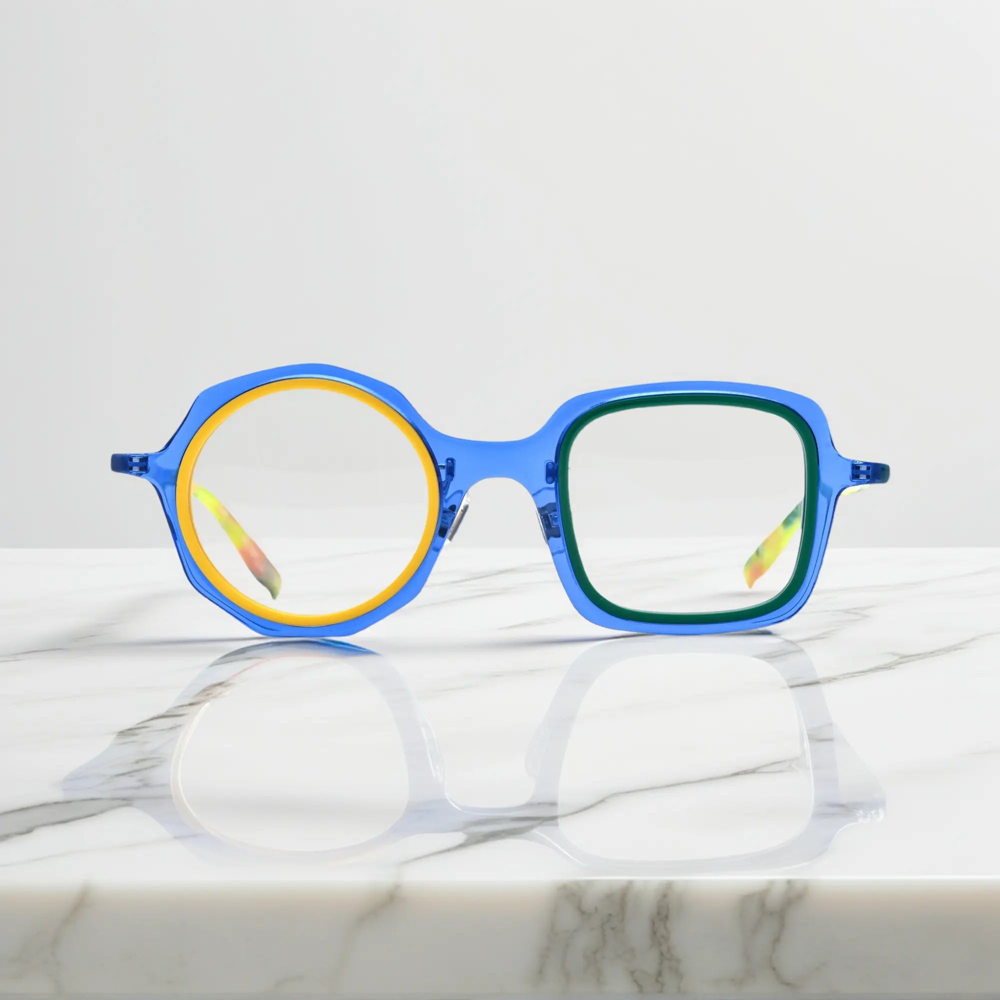 VoyueLens™ geometric eyeglasses in Navy Lemon color, shown in front view. Features acetate frame and silicone nose pads.