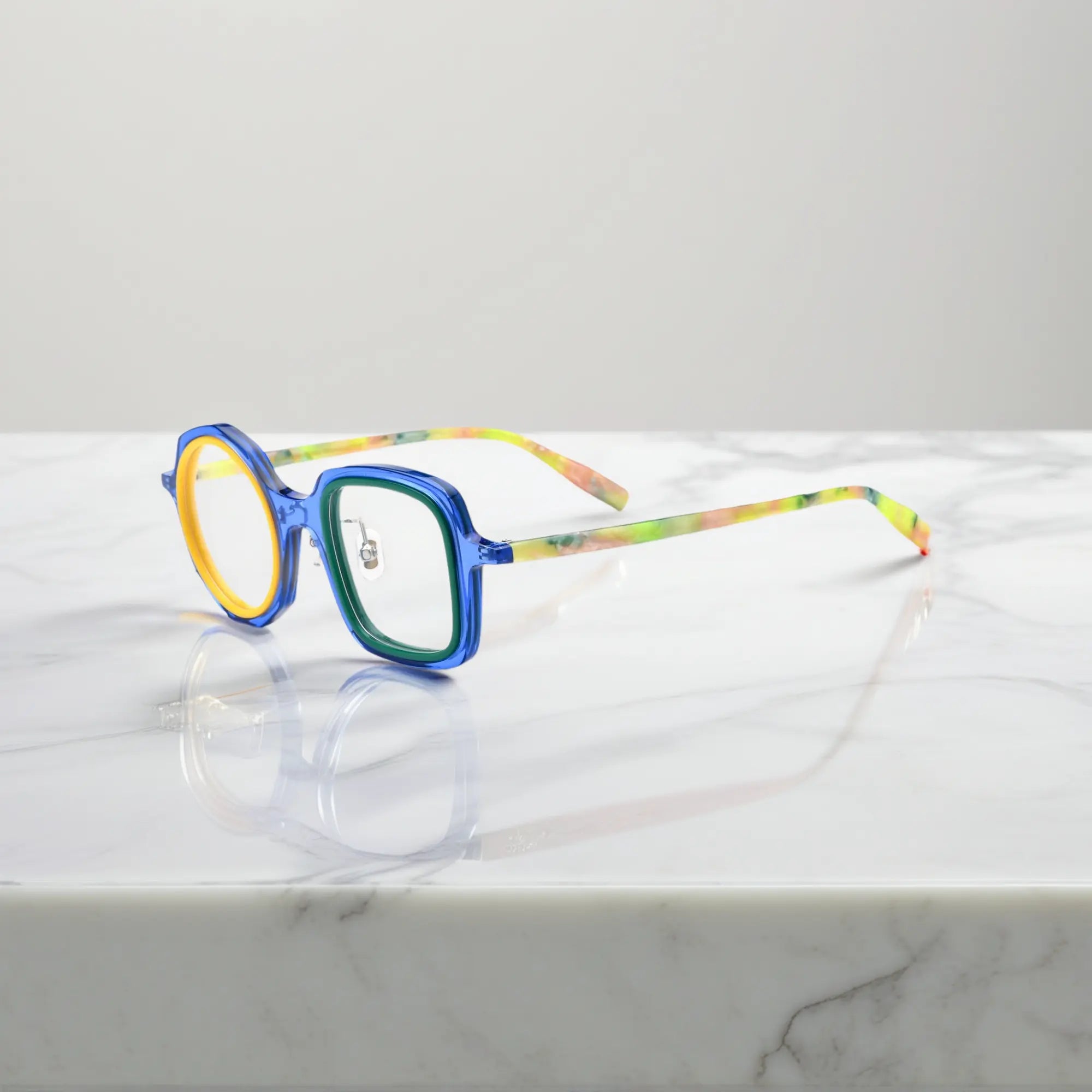 VoyueLens™ geometric eyeglasses in Navy Lemon color, side view showing dual-tone design and spring hinges.