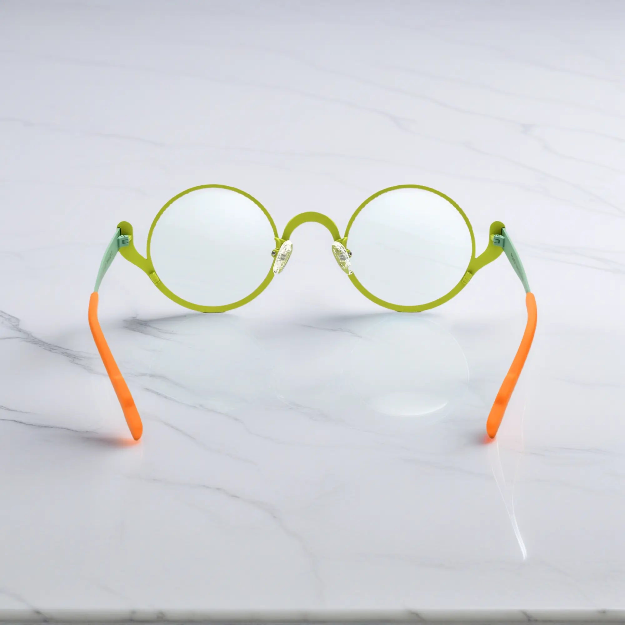 Rear view of Neon Grove round titanium glasses from VoyueLens™ – artistic color-block design
