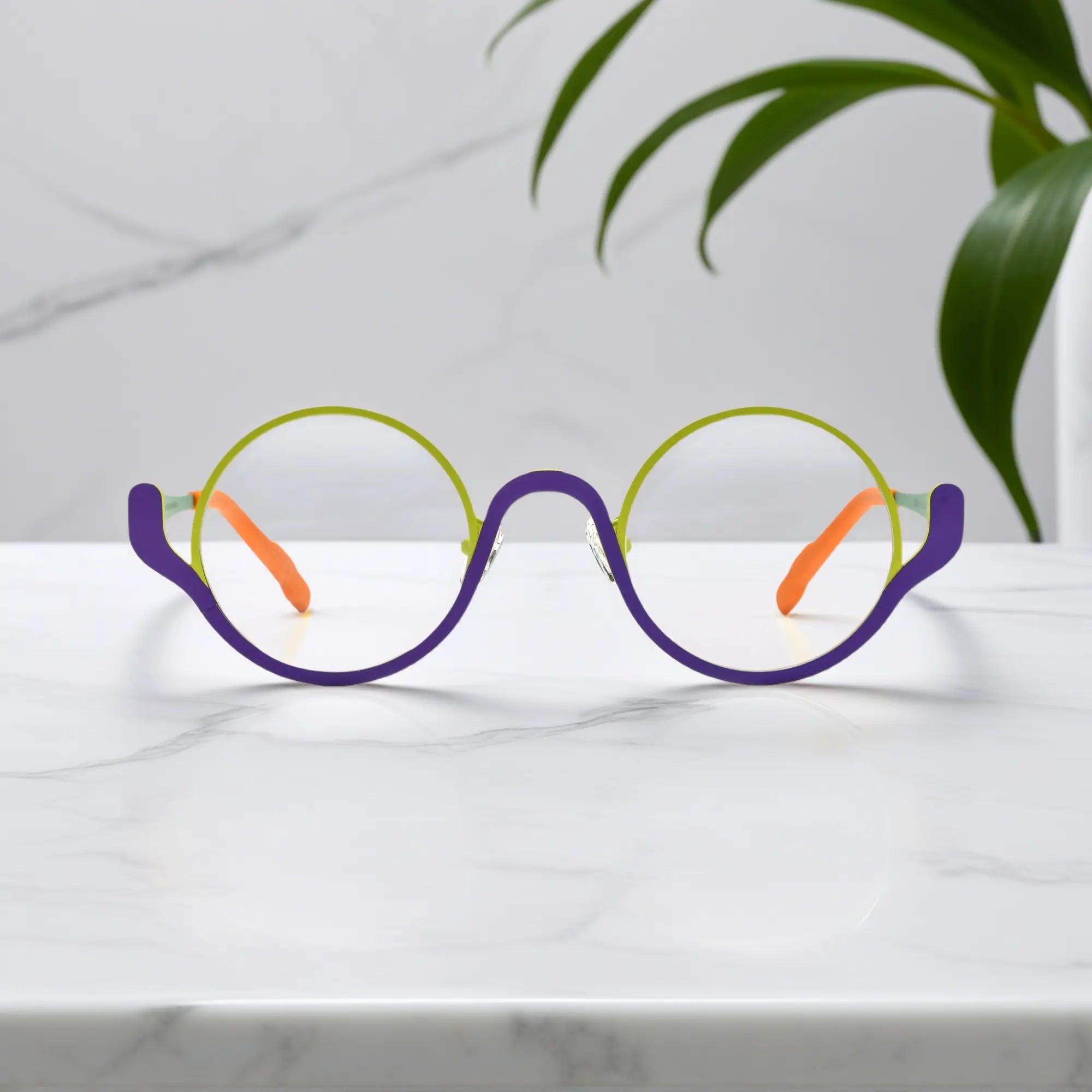 Front view of VoyueLens™ ChromoPop eyeglasses in Neon Grove – green and purple titanium frame