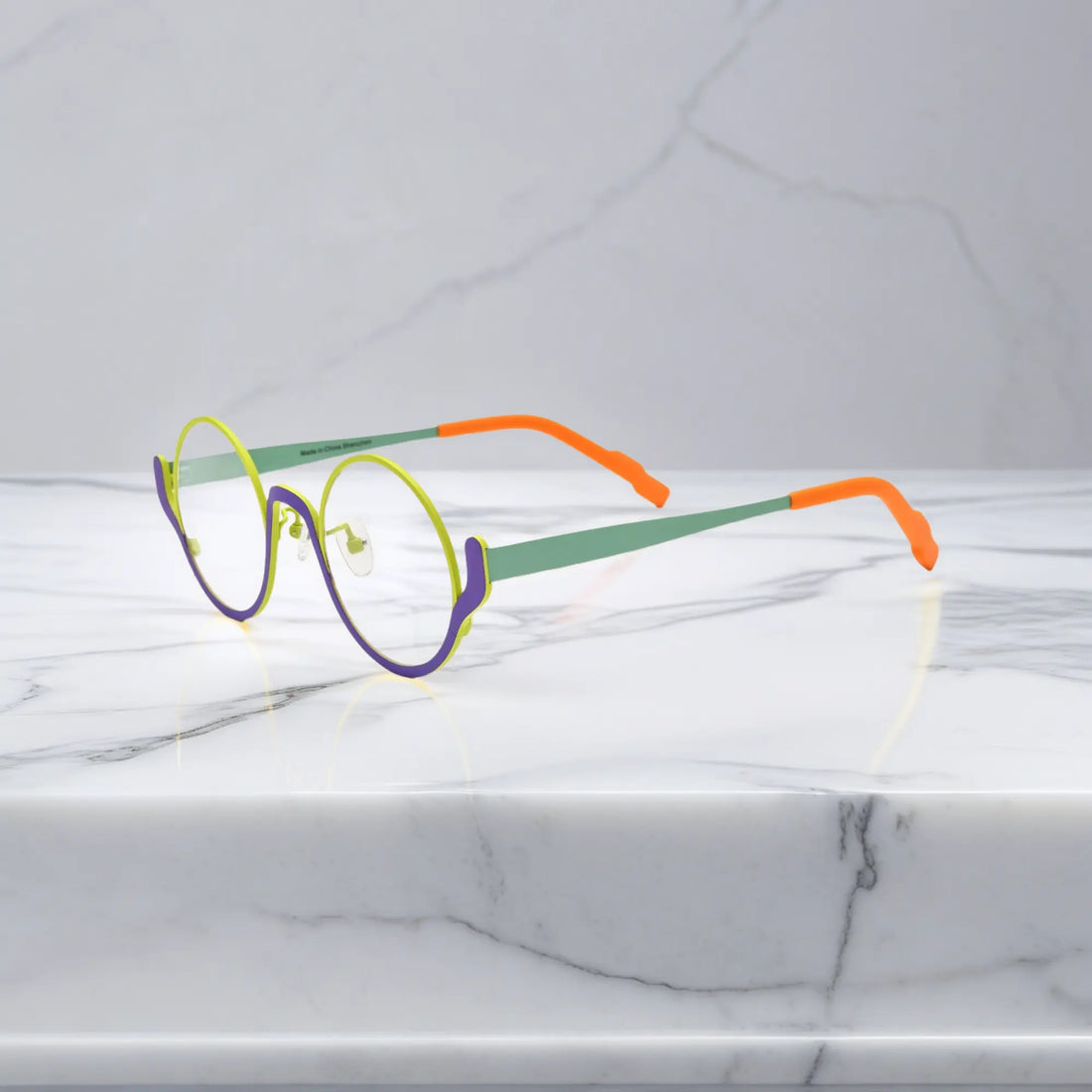 Side view of Neon Grove VoyueLens™ glasses – contrasting purple arms and nose bridge