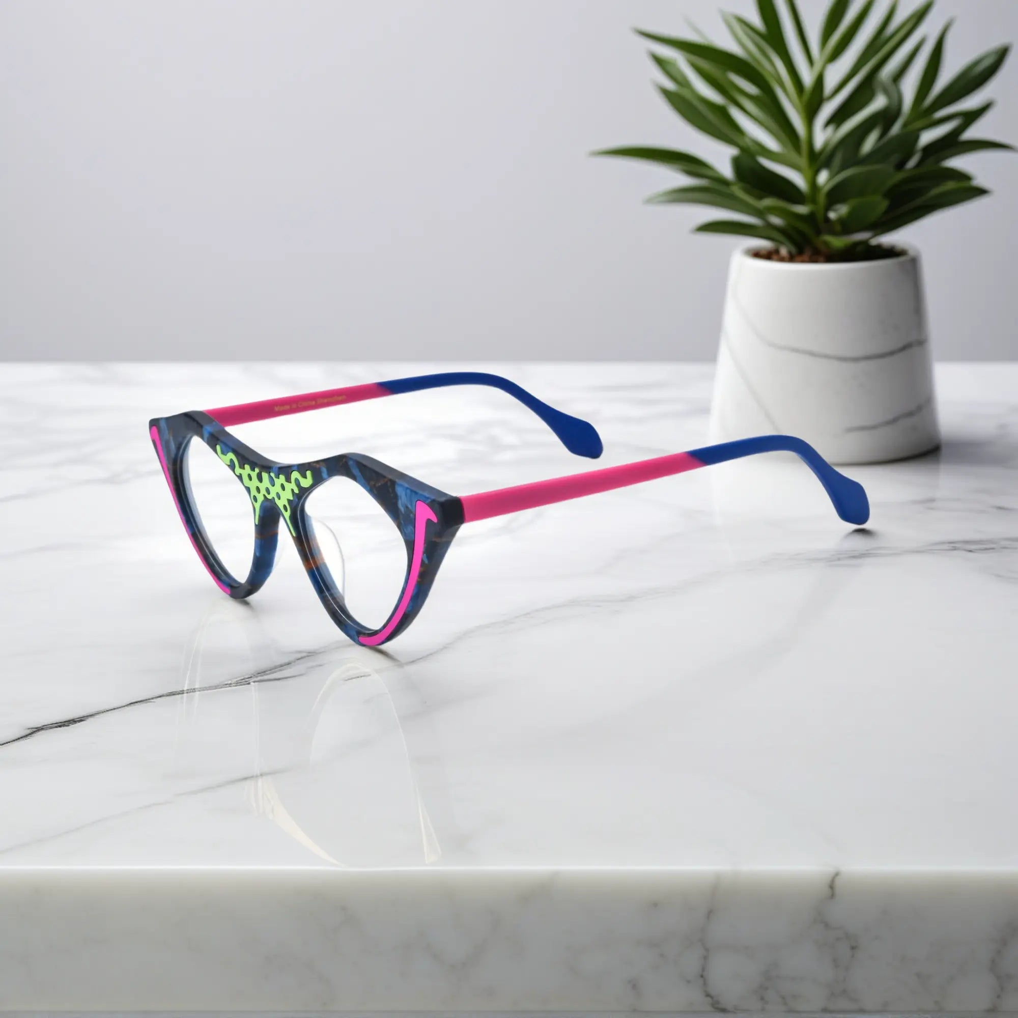 Side view of Neon Pop VoyueLens™ pixel cat-eye glasses featuring electric matte design
