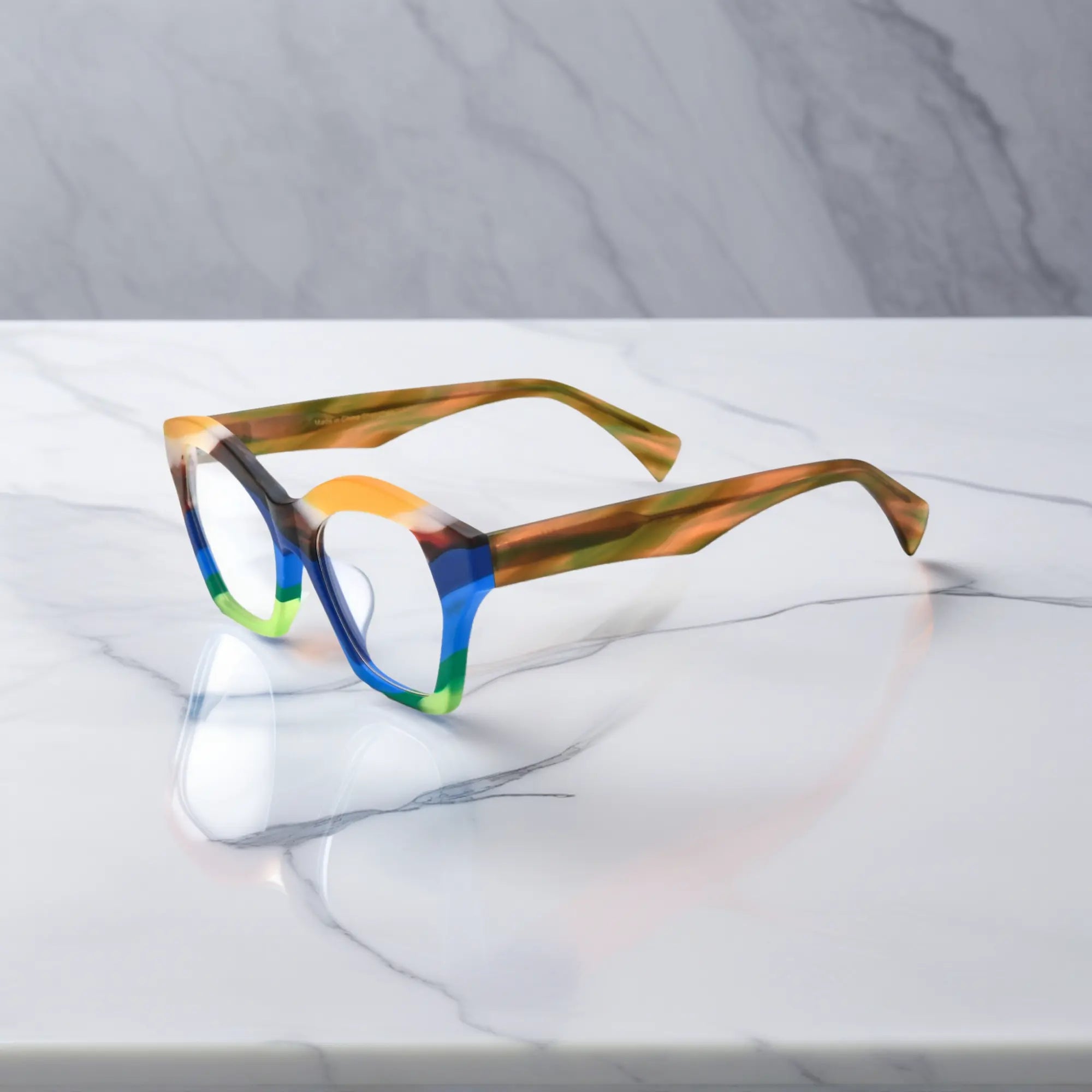 Side view of Ocean Carnival eyewear featuring dynamic color flow and elegant frame curvature.