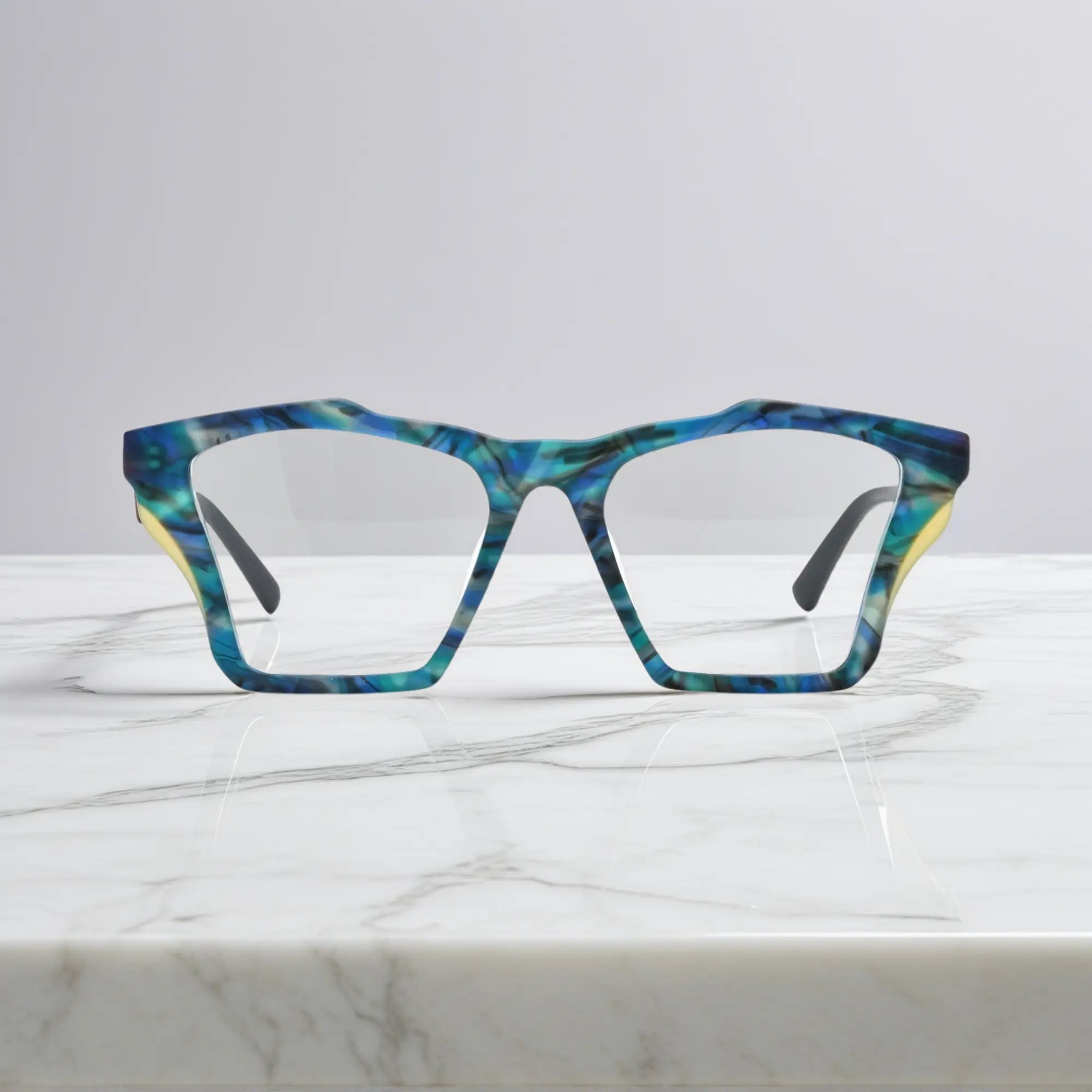 Front-facing view of VoyueLens™ Ocean Tortoiseshell butterfly eyeglass frame featuring matte teal and turquoise tortoiseshell finish, showcasing its signature matte butterfly design.