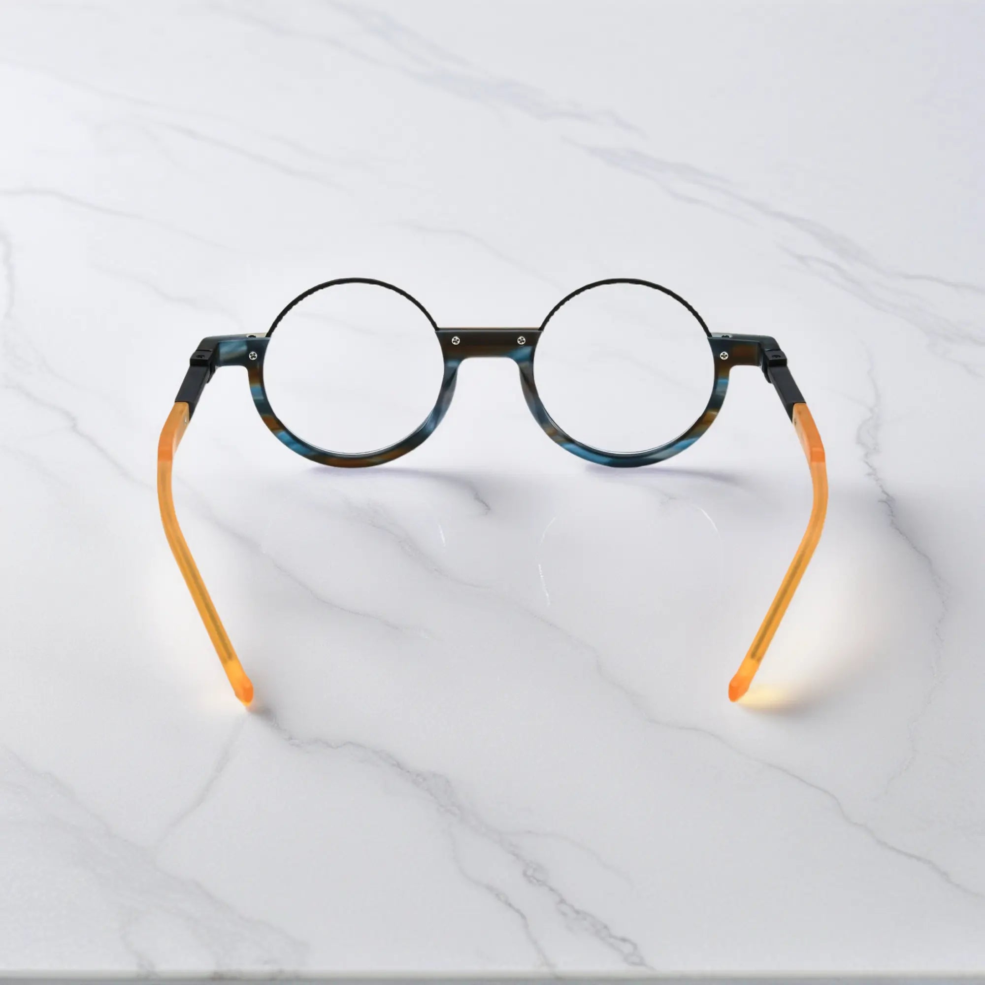 Back view of Ocean Tortoiseshell glasses with layered blue-black acetate blend and smooth curve finish.