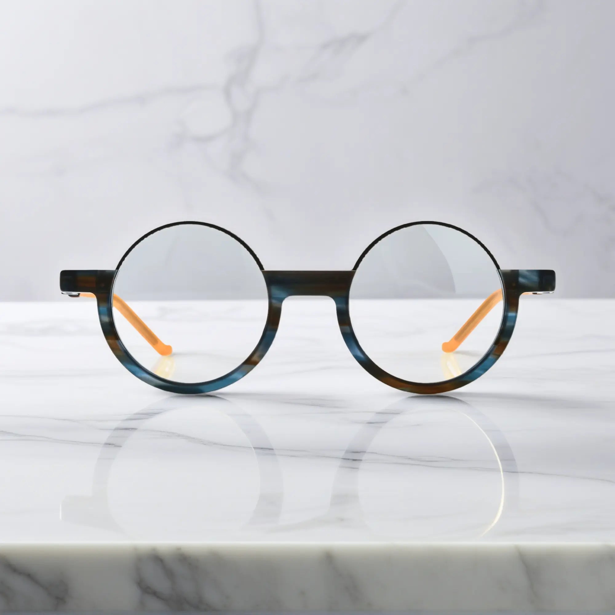 Front view of Ocean Tortoiseshell VoyueLens™ eyeglasses featuring deep blue tones and soft tortoise layering.