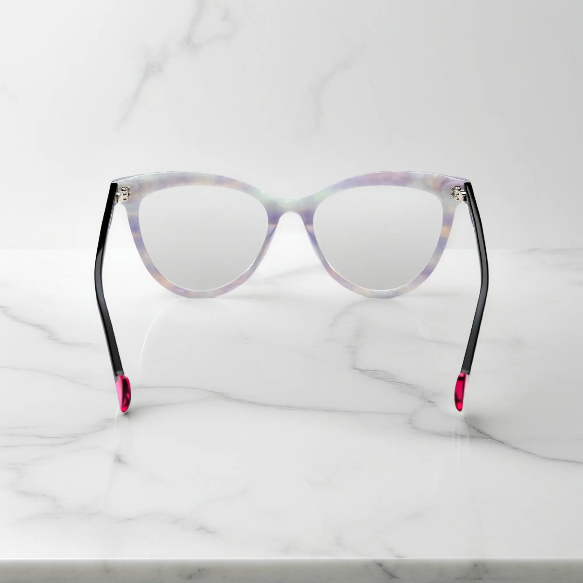 Back view of pearl white VoyueLens VL19362 frames with pink temple tips
