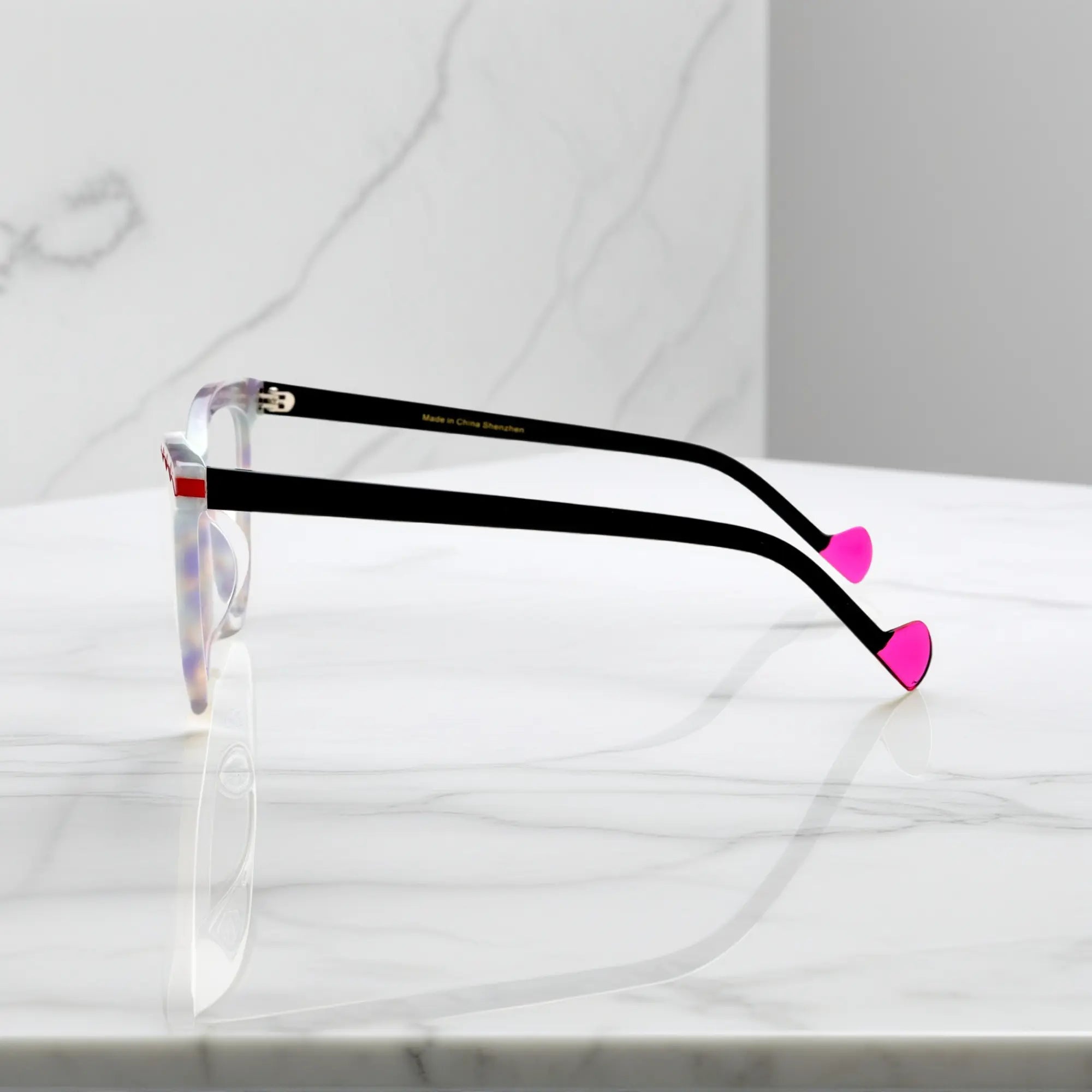 Side view of VoyueLens VL19362 pearl white glasses showing black temples