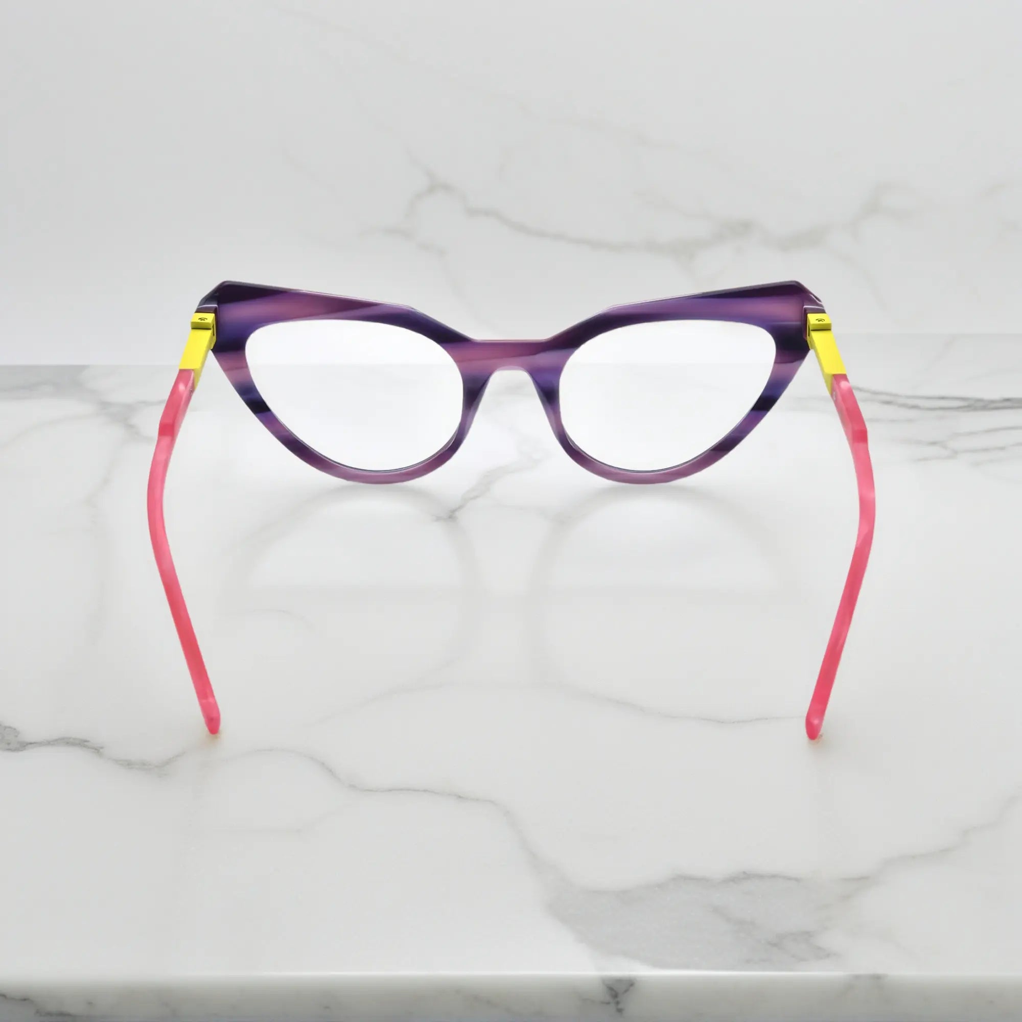 Back display of Plum Velvet matte eyeglass frame with soft violet sheen and sculpted fit.