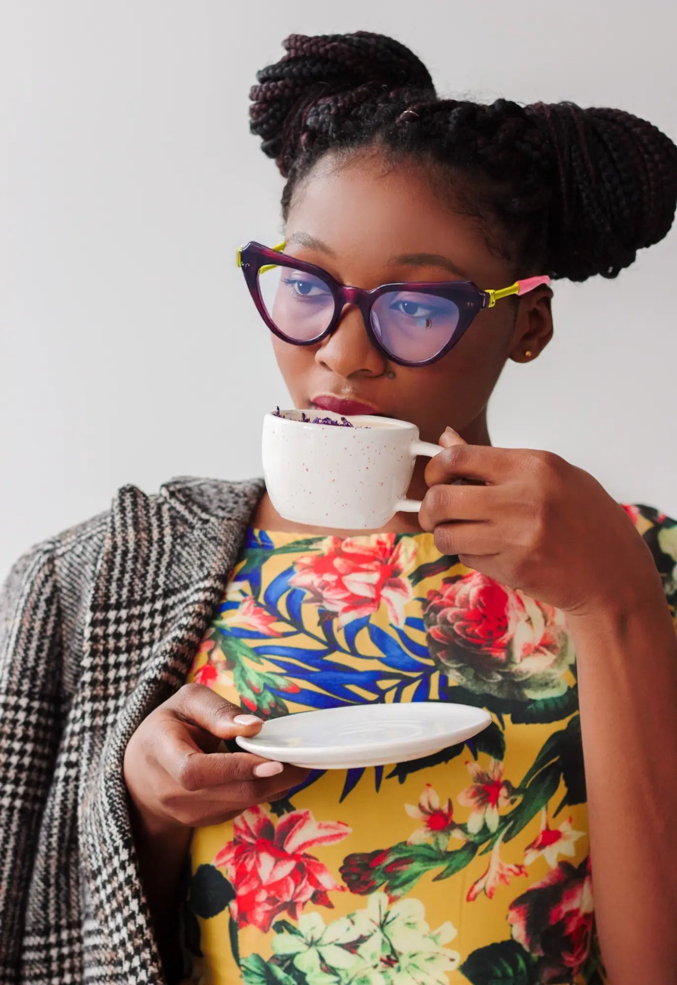 Model with bookish-chic aesthetic wearing Plum Velvet butterfly eyeglasses from VoyueLens™, perfect for creative expression.