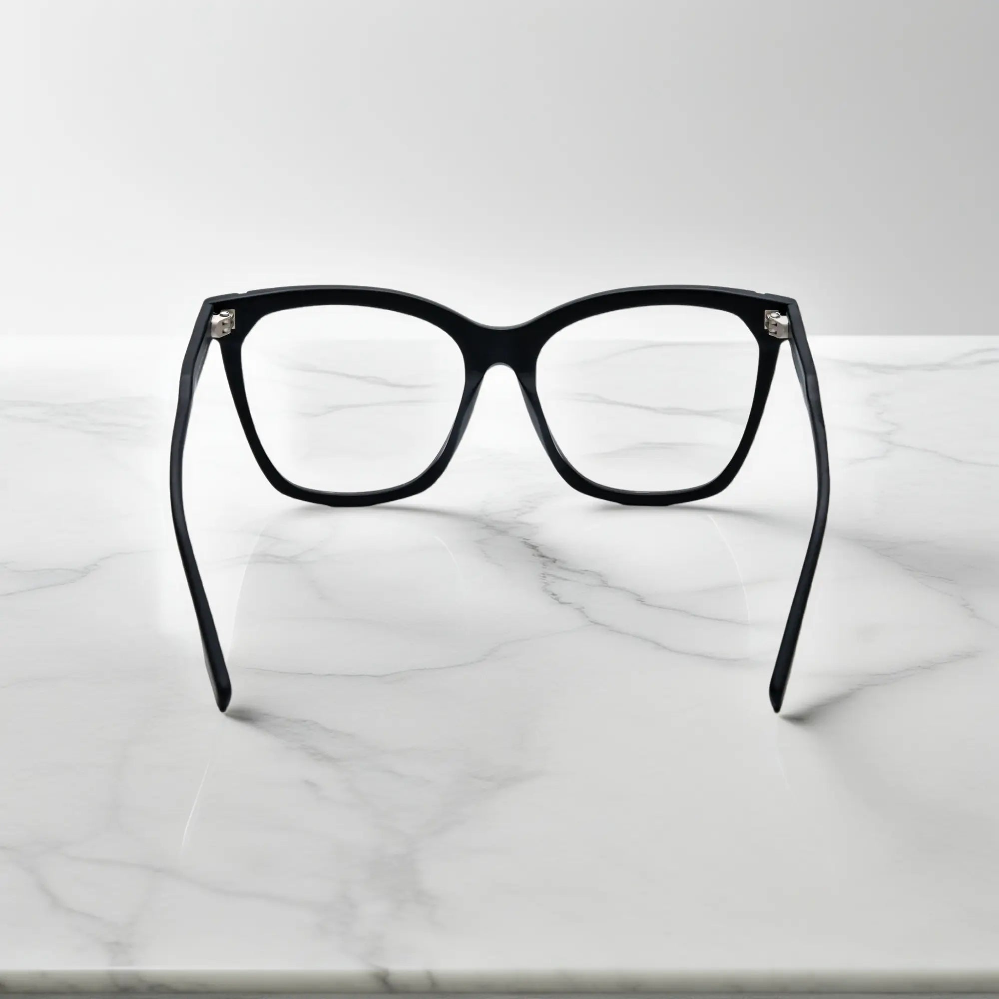 VoyueLens VL19343 Pure Onyx Black matte acetate square eyeglasses (unisex) are shown from the back view, highlighting the durable black matte finish of the frame.