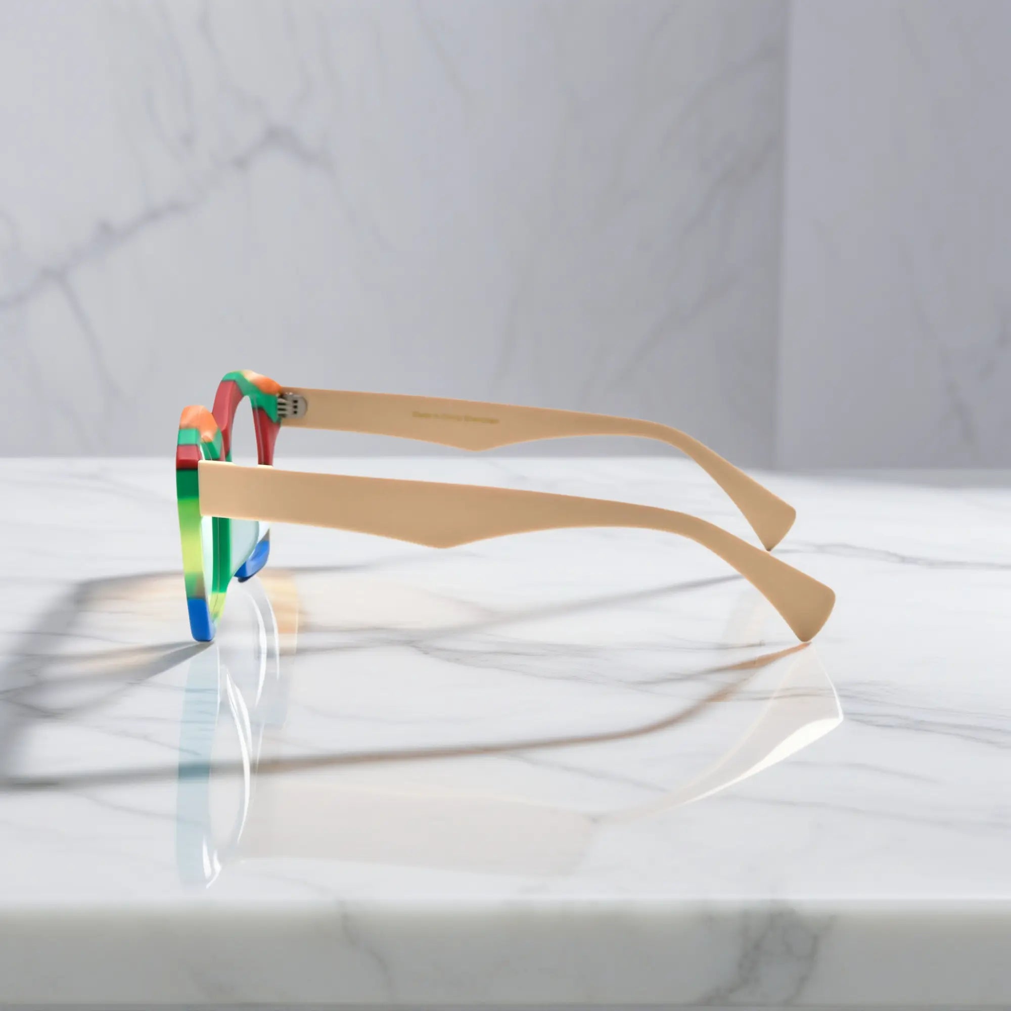 Side view of VoyueLens™ Rainbow Cream cat-eye frame showing elegant acetate curvature and temple detail.