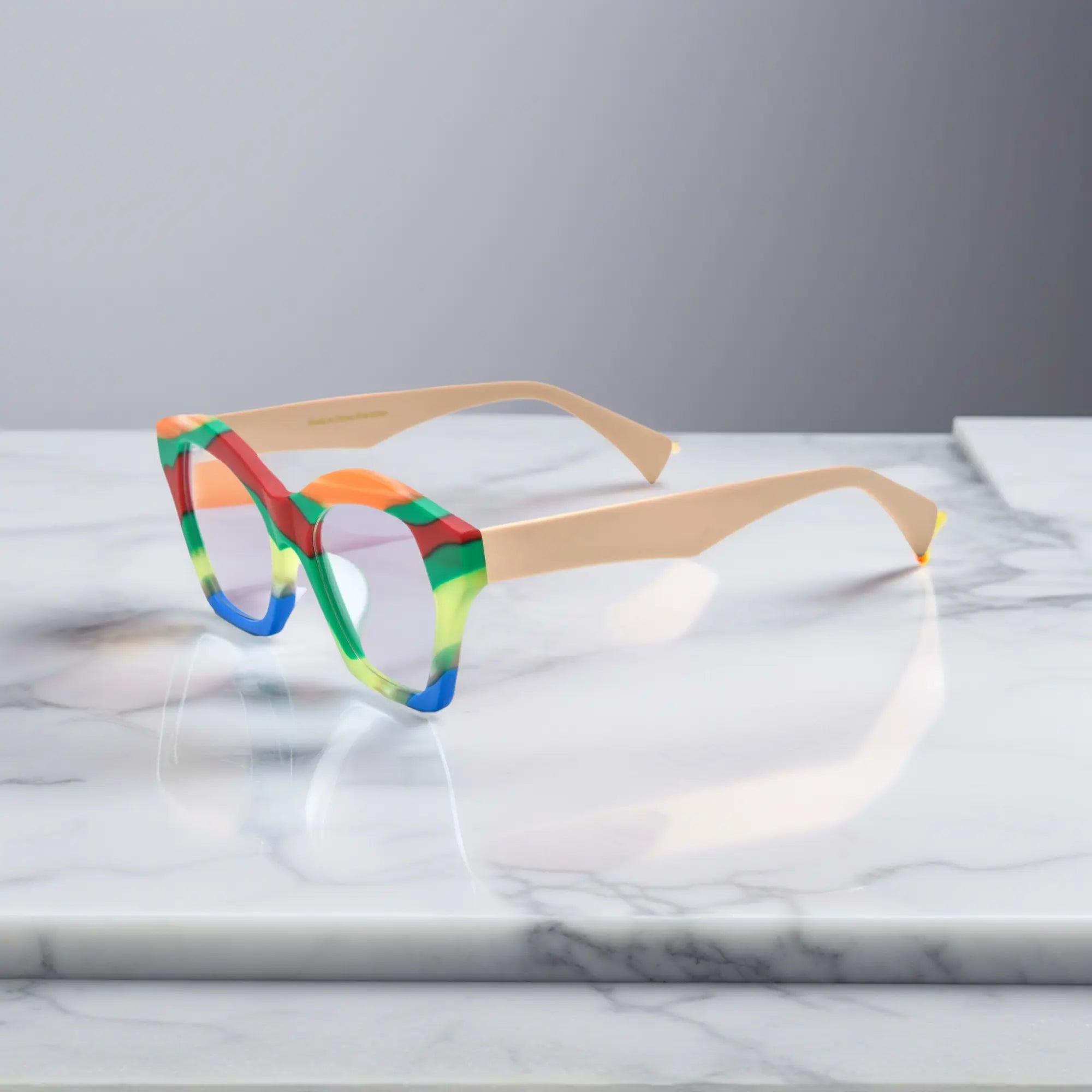 Side profile of VoyueLens™ Rainbow Cream cat-eye frame showing elegant acetate curvature and temple detail.
