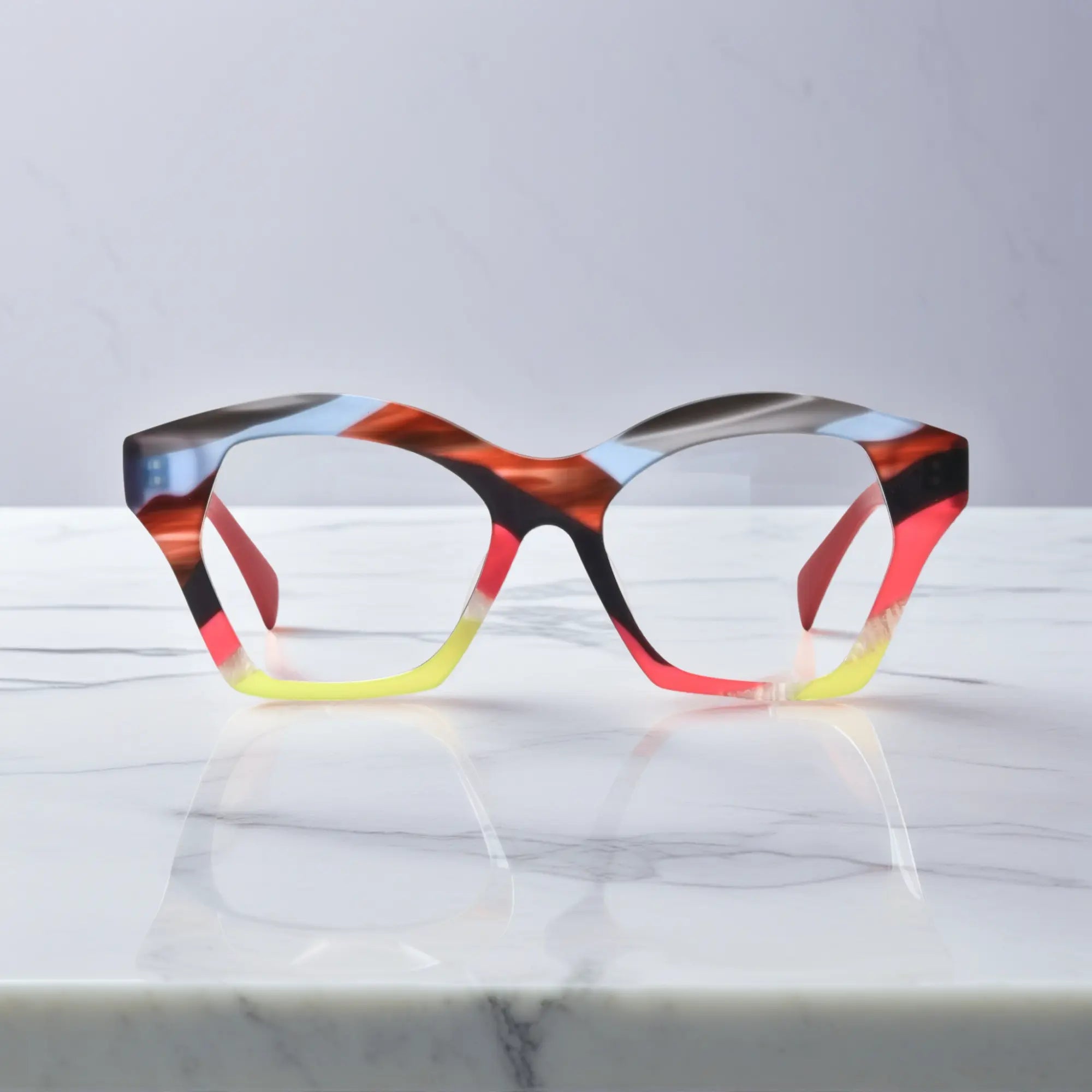 Front view of VoyueLens™ Rainbow Flame eyeglasses featuring vibrant warm-tone gradient in bold butterfly shape.