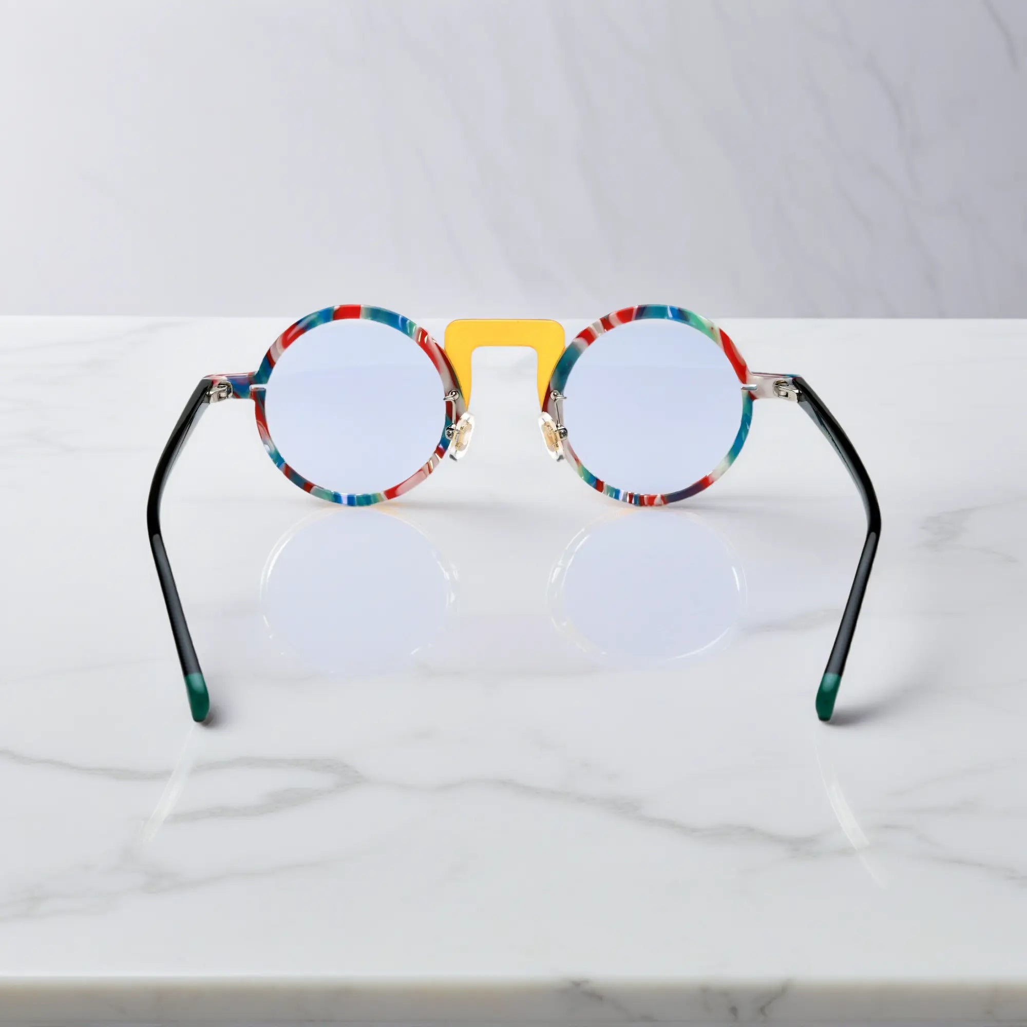 Back of Rainbow Pop glasses with bold artistic rainbow pattern