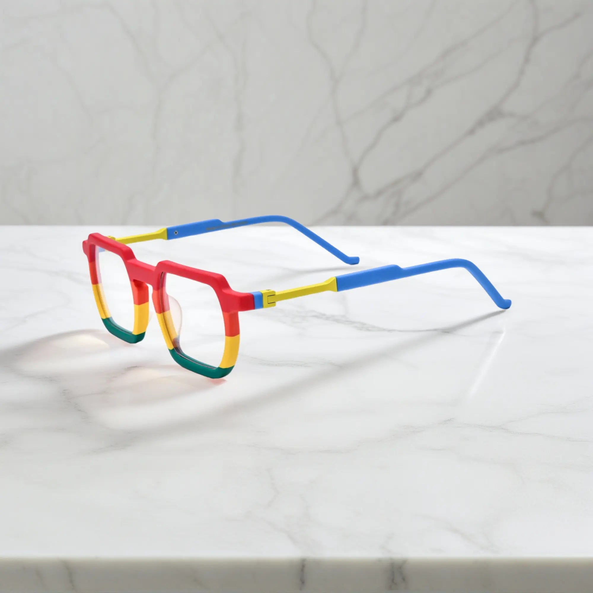 Side angle of VoyueLens™ Rainbow Rush statement frames with multi-color gradient detailing and sculpted acetate arms in tortoiseshell
