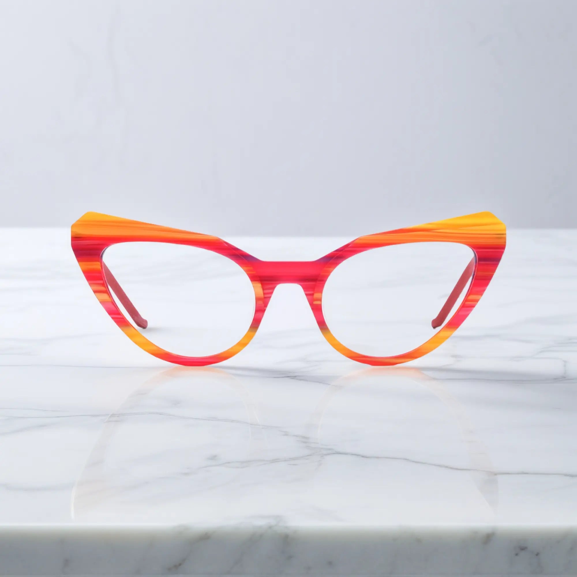Front shot of VoyueLens™ Rainbow Stripe butterfly eyeglasses with vibrant multi-color striping and a wide cat-eye shape.
